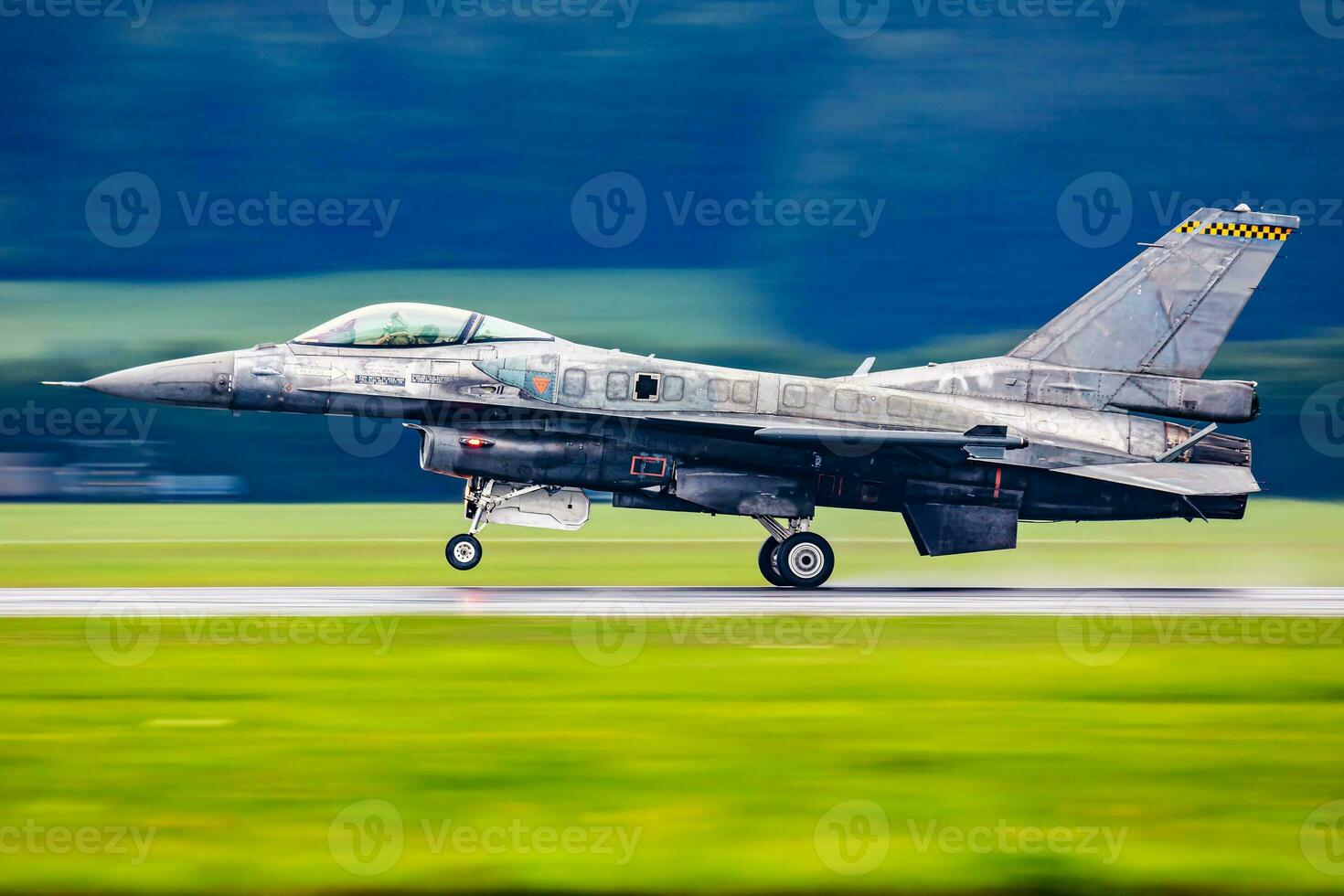 Military fighter jet plane at air base. Airport and airfield. Air force flight operation. Aviation and aircraft. Air defense. Military industry. Fly and flying. photo