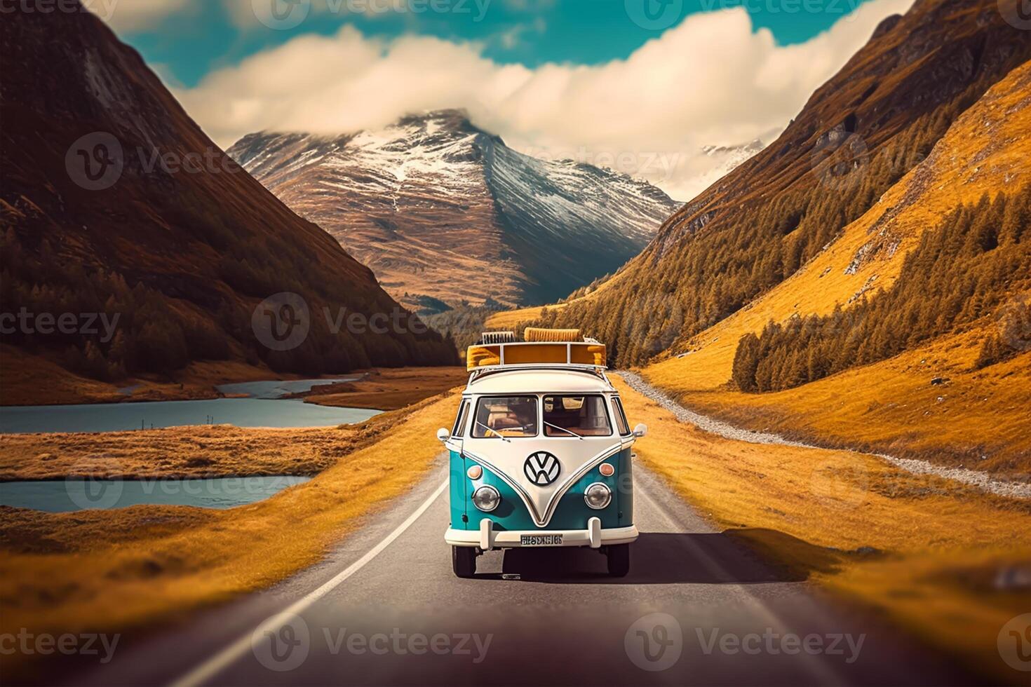 Vintage camper van on road in the mountains photo