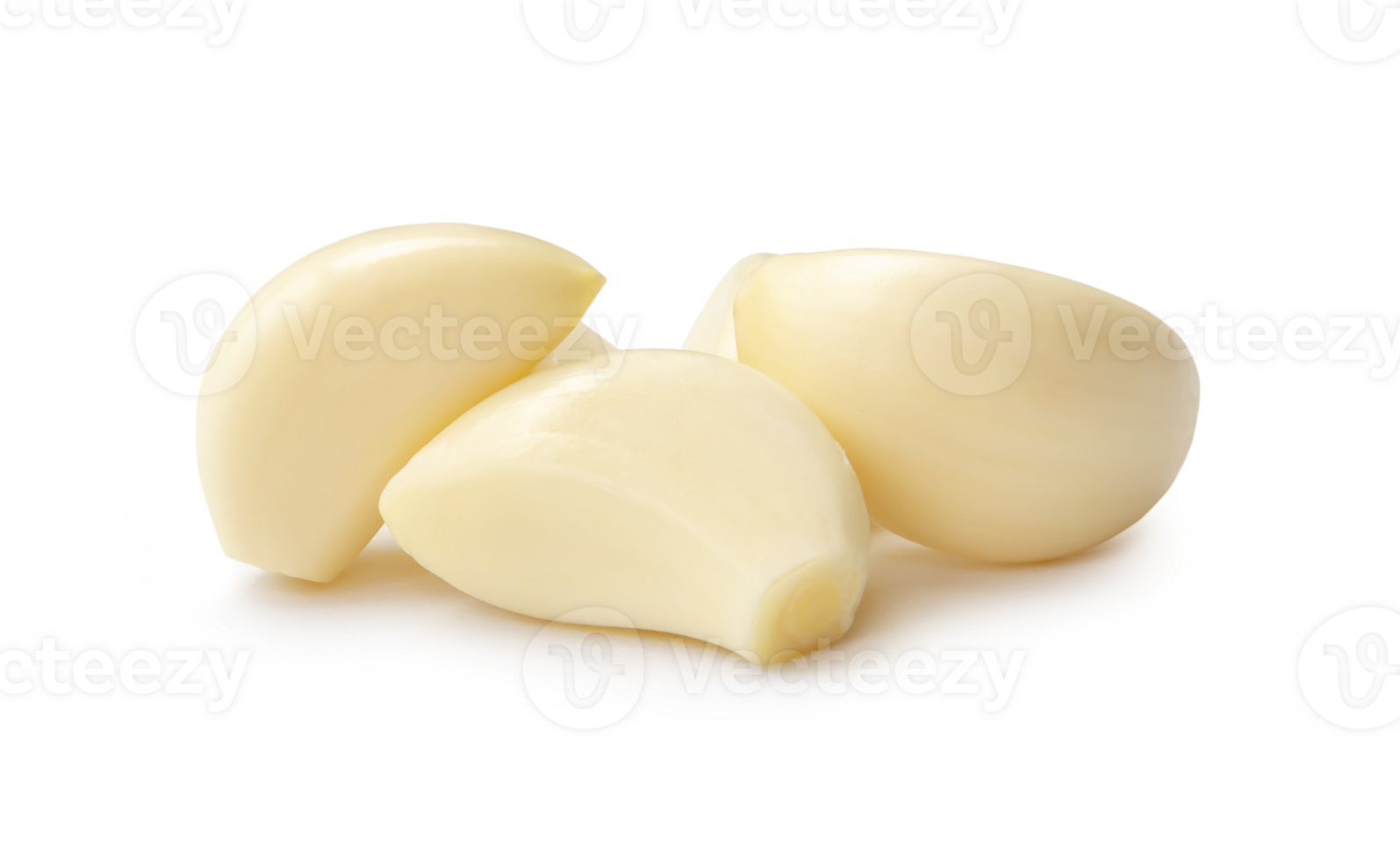 Peeled garlic cloves in stack isolated with clipping path and shadow in