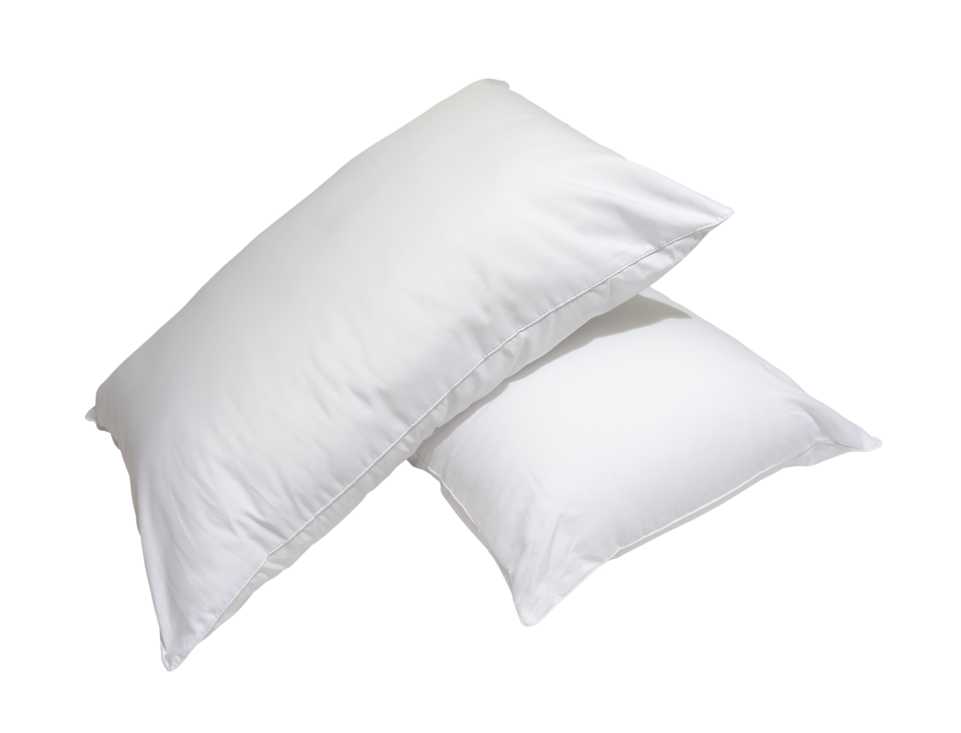 White pillows in stack in hotel or resort room isolated with clipping