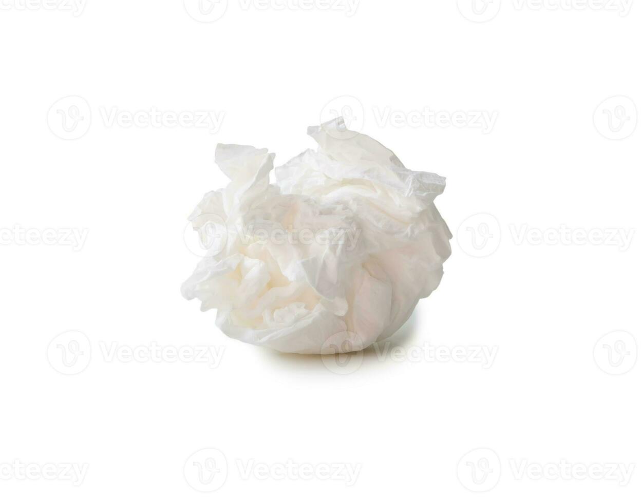 Single screwed or crumpled tissue paper or napkin in strange shape after use in toilet or restroom isolated on white background with clipping path. photo
