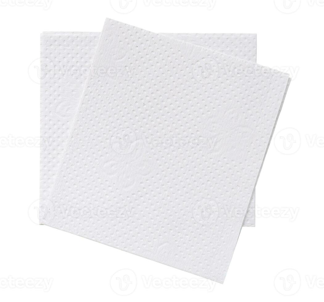 Top view of two folded pieces of white tissue paper or napkin in stack isolated on white background with clipping path. photo