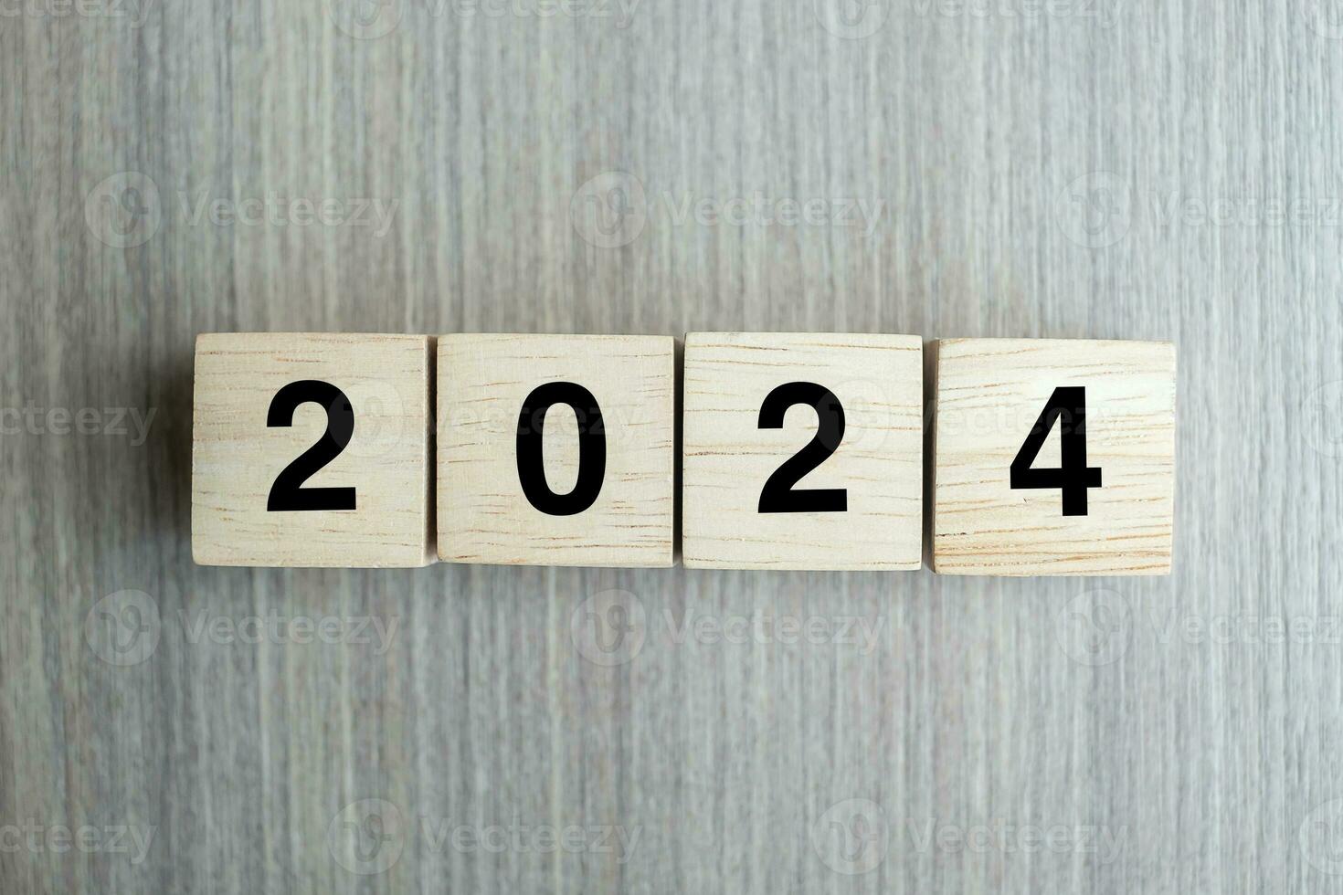 block 2024 text on table. Resolution, strategy, plan, goal, motivation, reboot, business and New Year holiday concepts photo