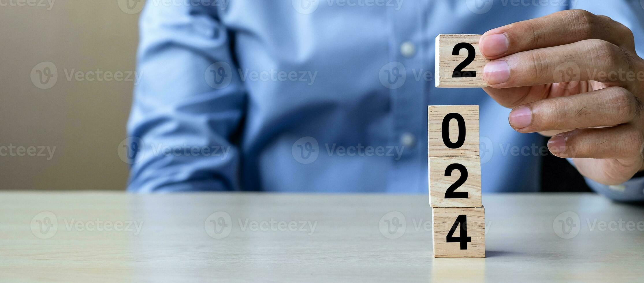 block 2024 text on table. Resolution, strategy, plan, goal, motivation, reboot, business and New Year holiday concepts photo