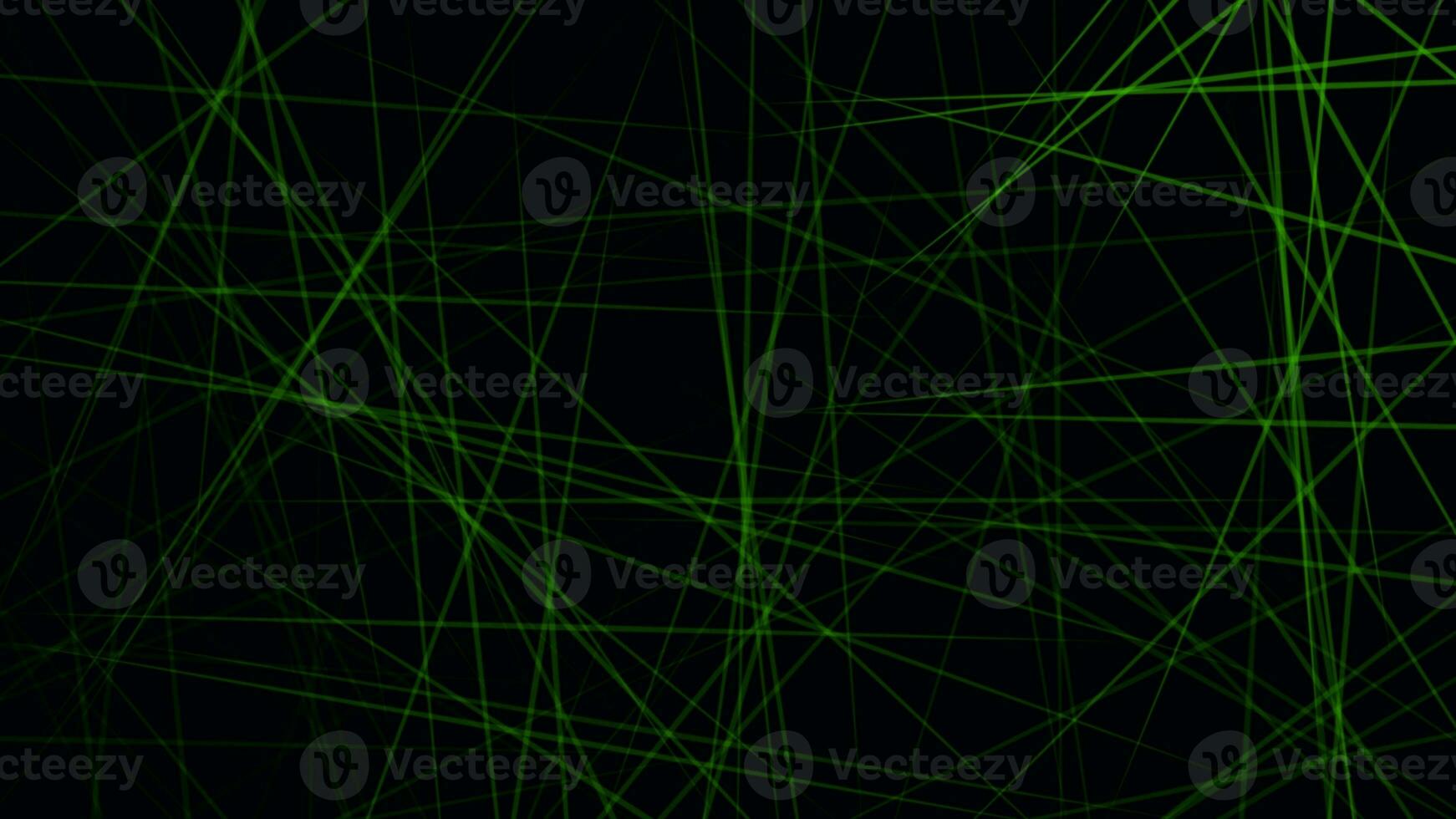 Green laser light in dark abstract background photo