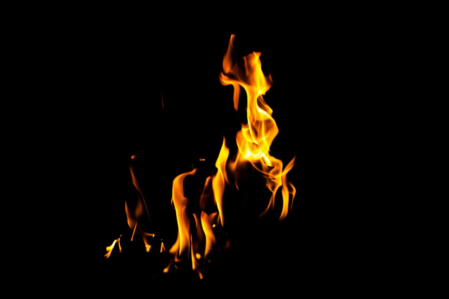 Fire flame texture. Burning material backdrop. Burn effect pattern. Blaze and torch wallpaper. Heat and haze backdrop. photo