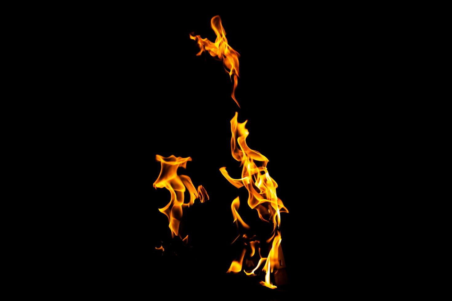 Fire flame texture. Burning material backdrop. Burn effect pattern. Blaze and torch wallpaper. Heat and haze backdrop. photo