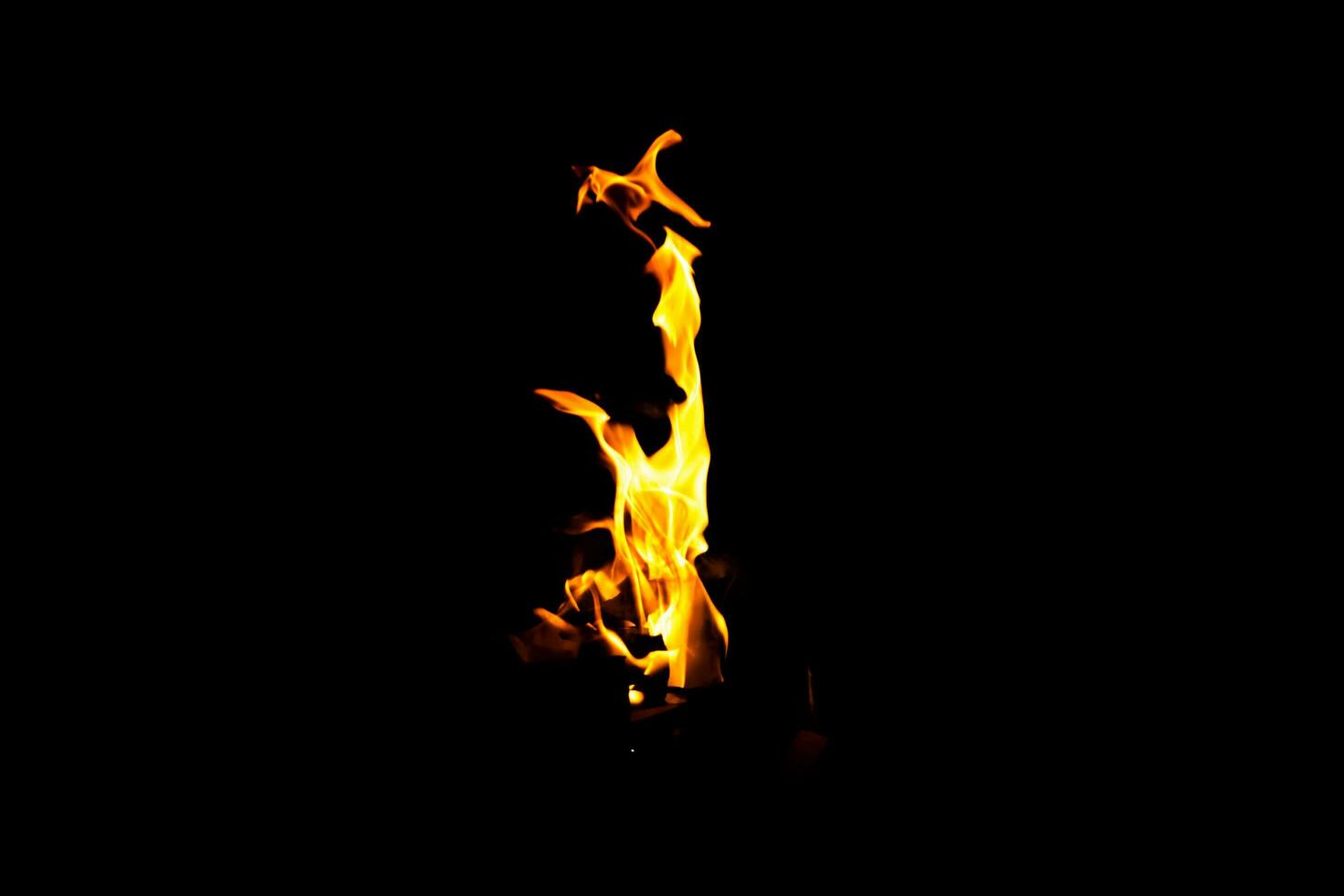 Fire flame texture. Burning material backdrop. Burn effect pattern. Blaze and torch wallpaper. Heat and haze backdrop. photo