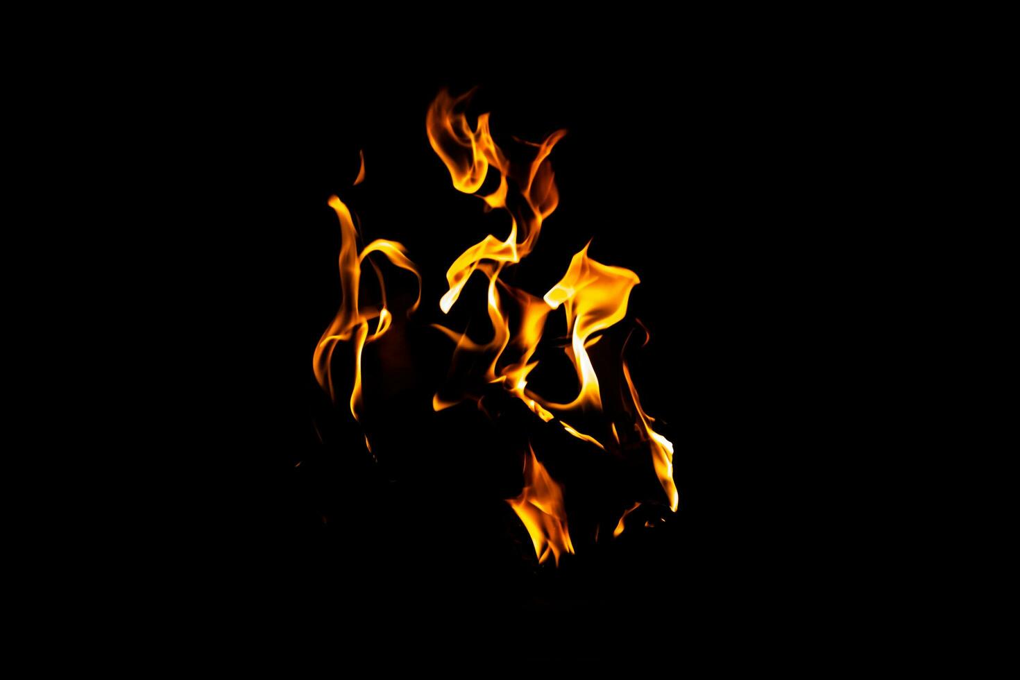 Fire flame texture. Burning material backdrop. Burn effect pattern. Blaze and torch wallpaper. Heat and haze backdrop. photo