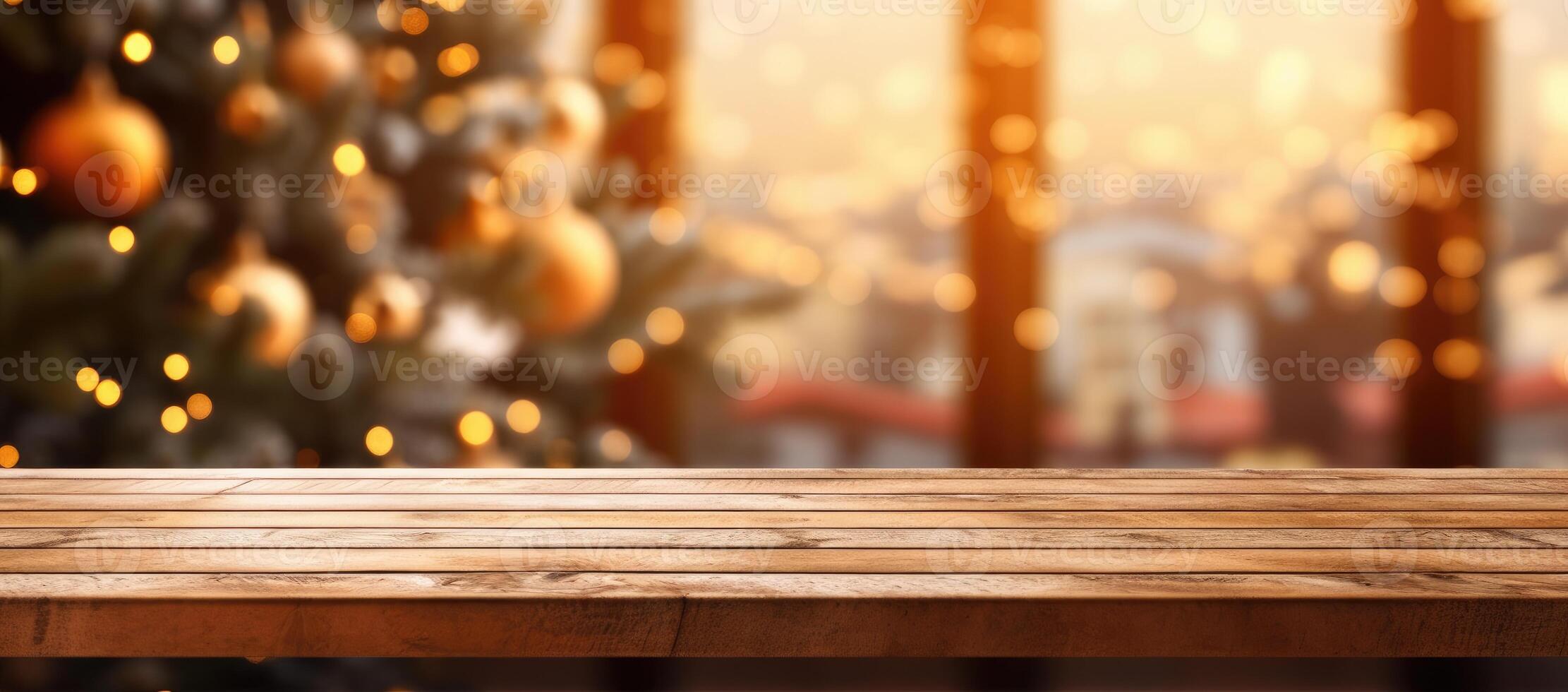 Christmas decorations on wooden floor, lights with bokeh effect in the background. photo