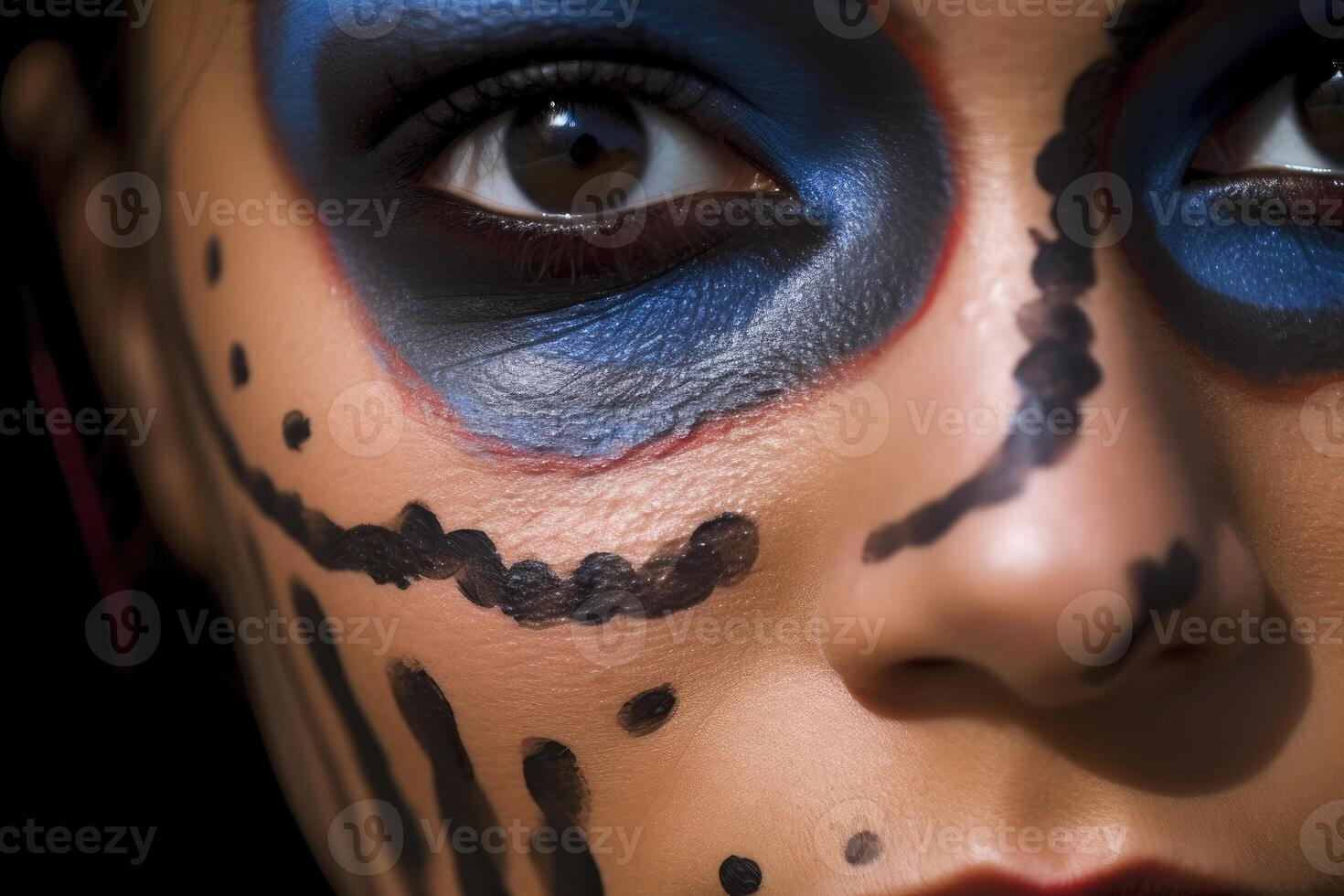 Close - up photo of a woman's face with Halloween makeup.