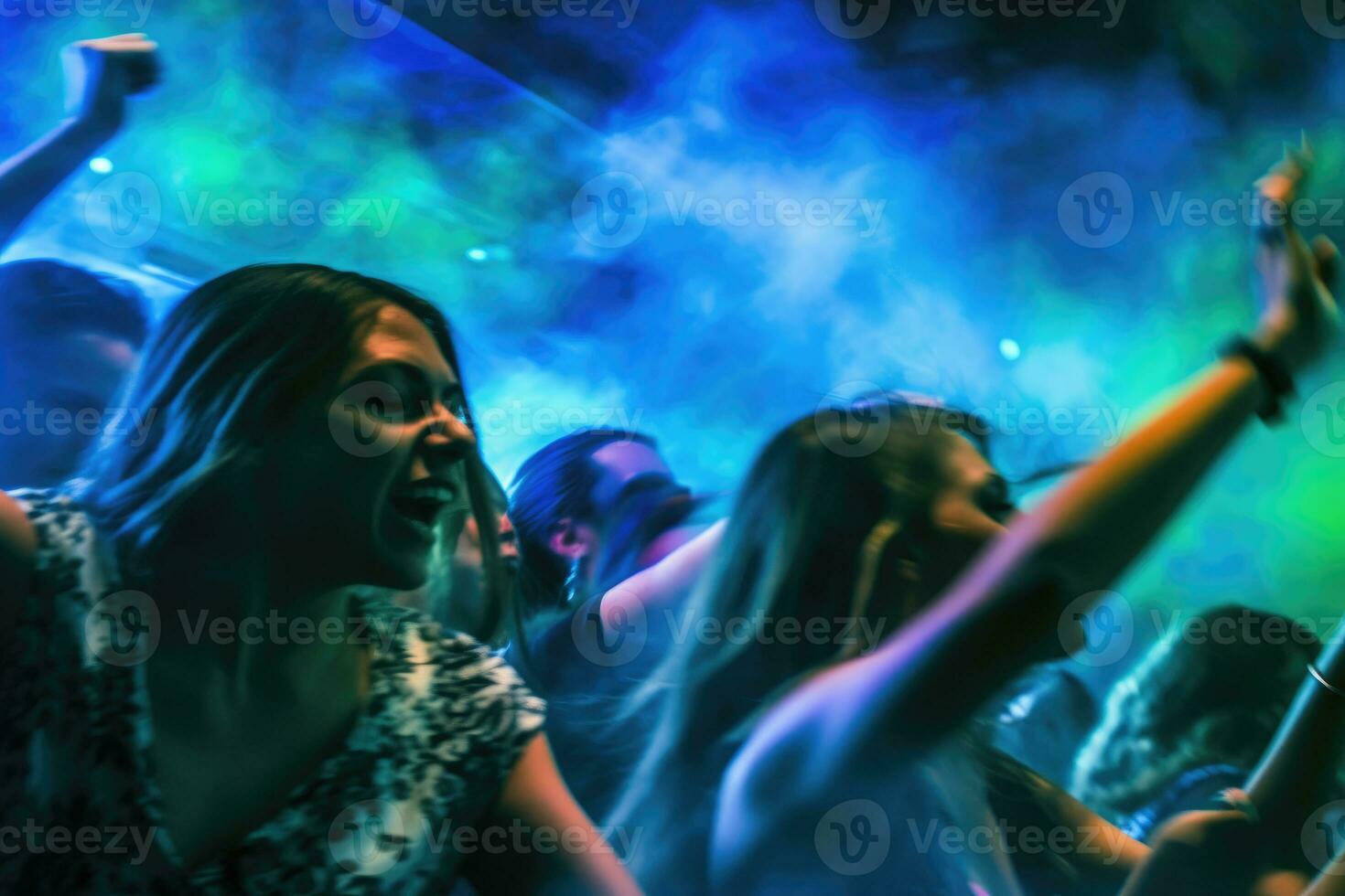 The vibrant energy of a crowded nightclub with colorful lights and pulsating music. Motion blur, highlighting the dynamic dance moves of the beautiful girls and guys. Generative AI photo