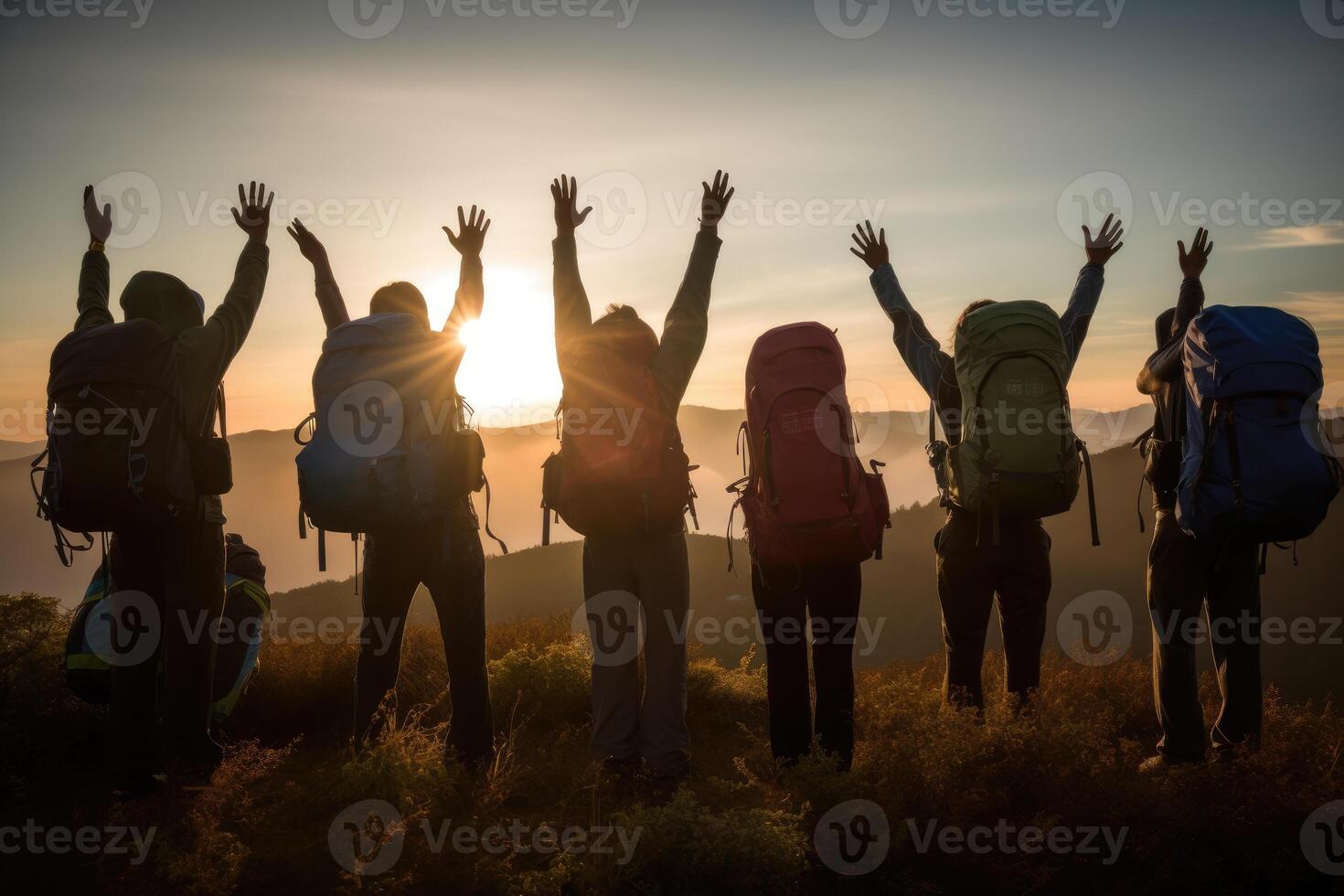 A close - up of the hikers' backpacks and hands. photo
