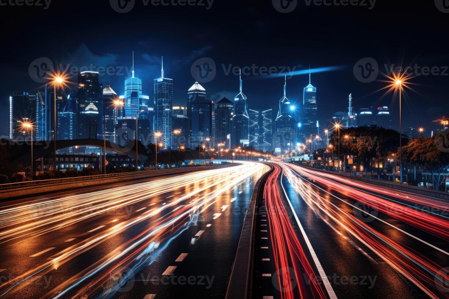 A busy highway at night, trails of light from the moving vehicles creating a dynamic pattern. photo