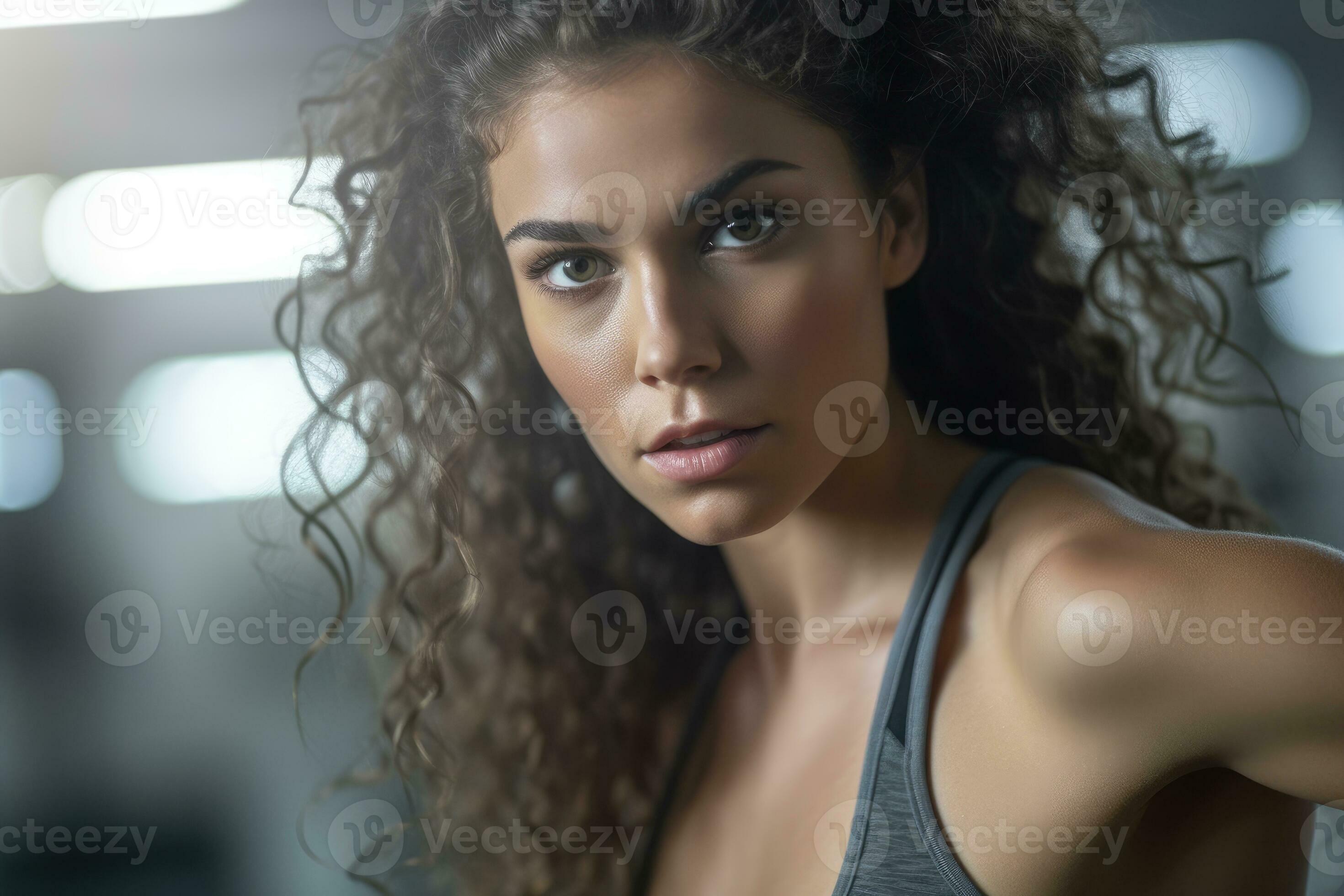 The strength and agility of a female athlete as she engages in high