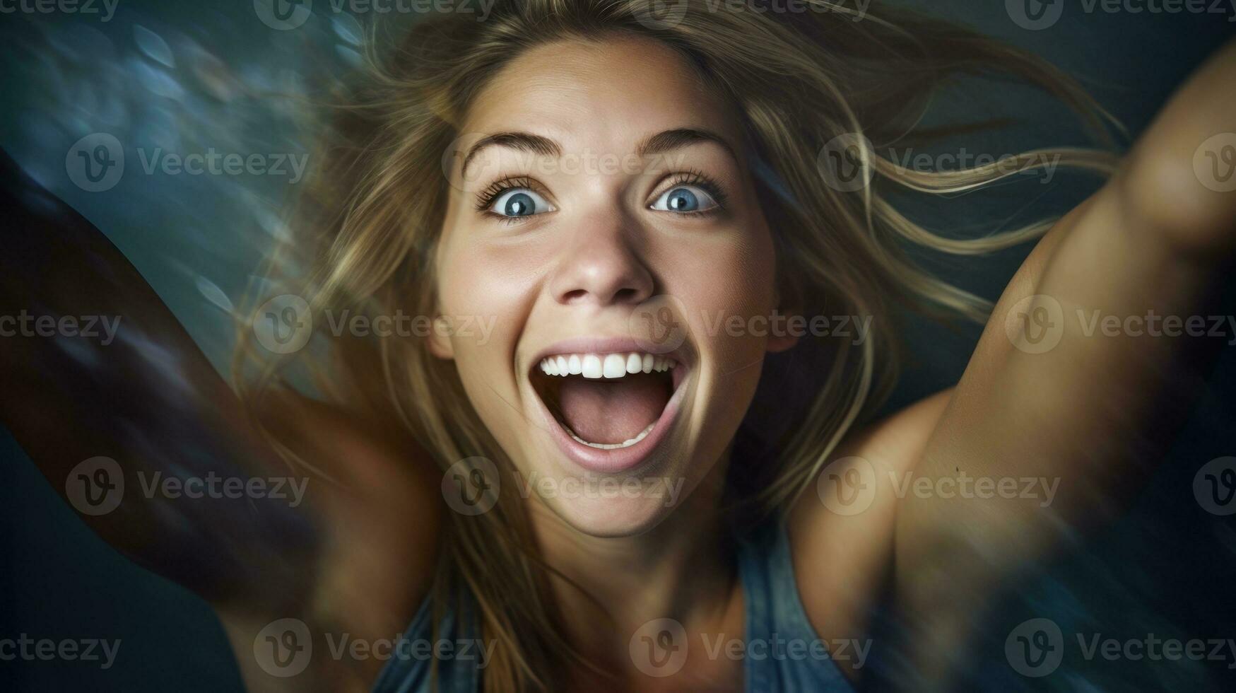 Shocked happy beautiful woman photo