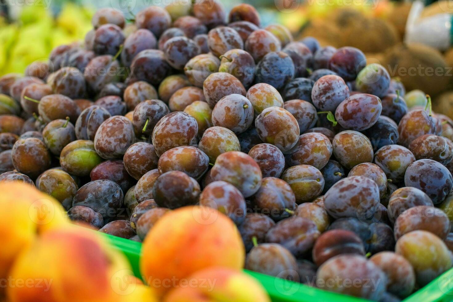 Plums ready for sale. Plums market. Plums after harvest. Common plum. photo