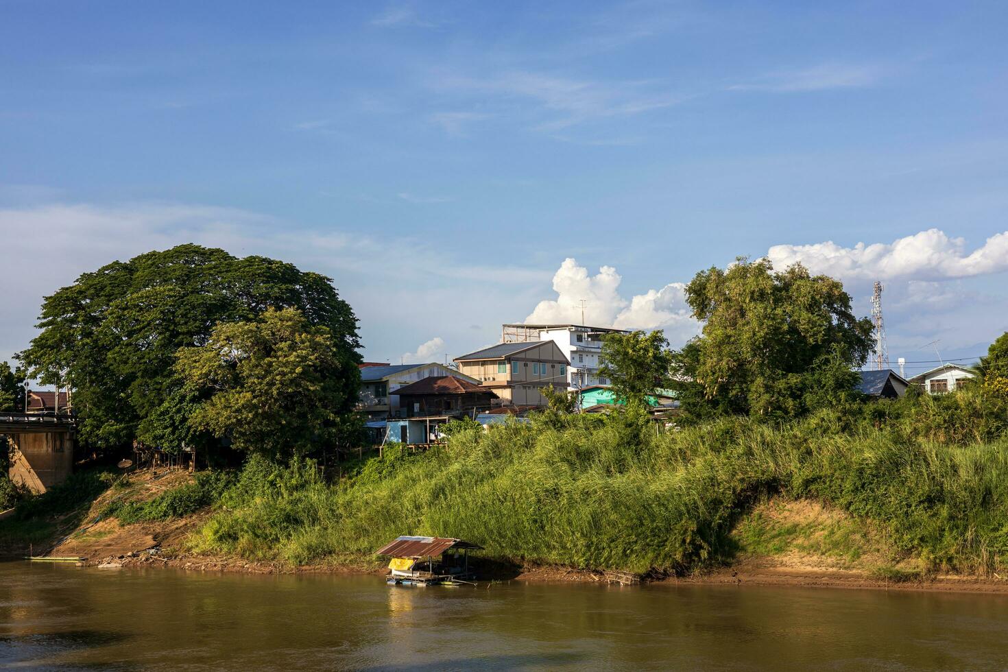 Scenery of many residential houses erected along the banks. photo