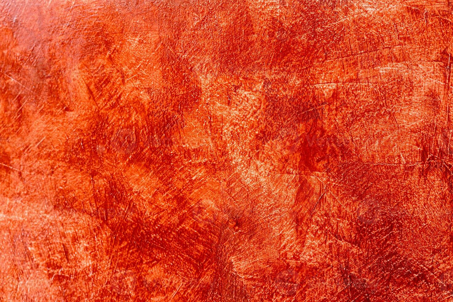Close up abstract background, white concrete wall which is plastered with red oil paint feels. photo