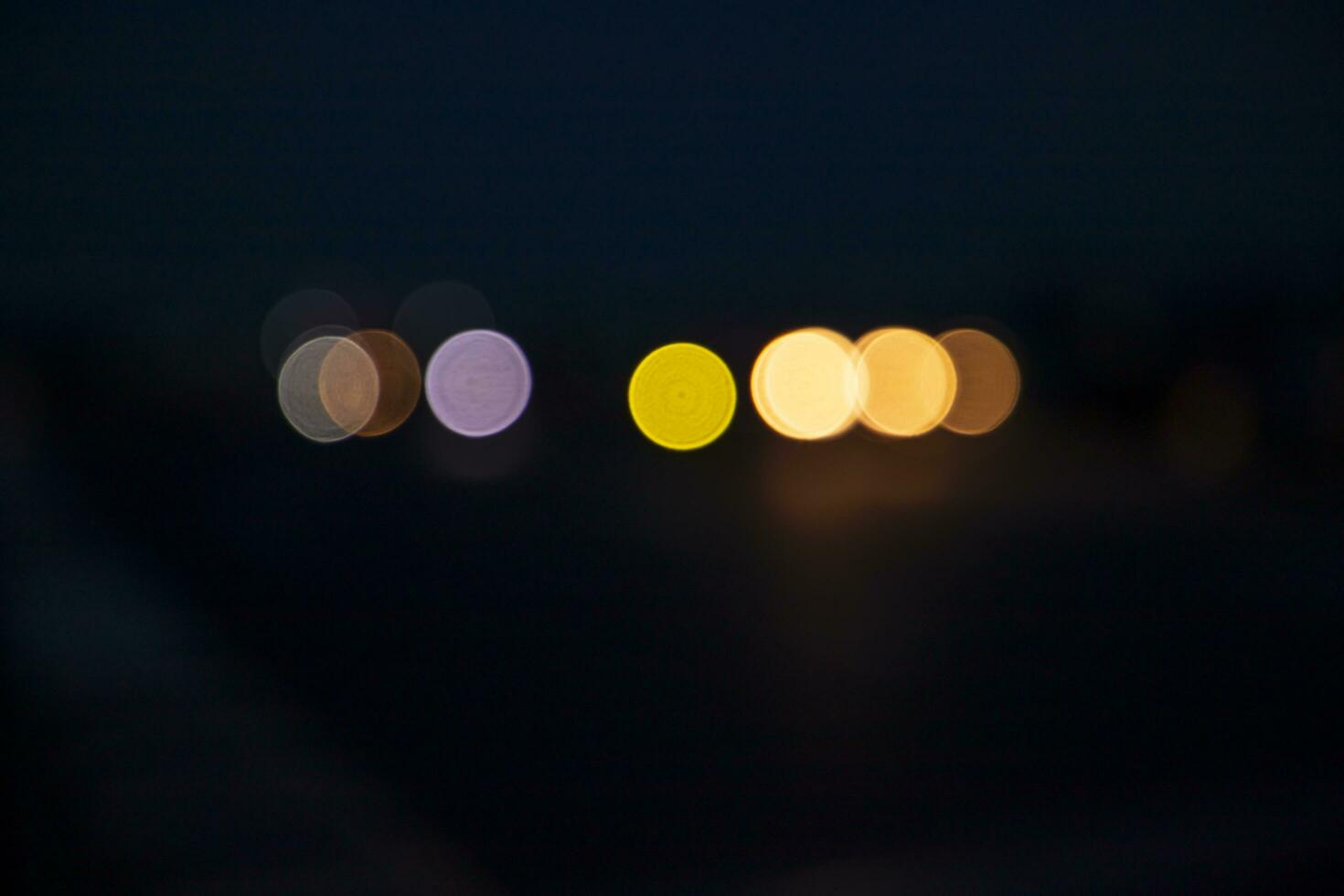 Night city street traffic abstract blurry bokeh lights background photo