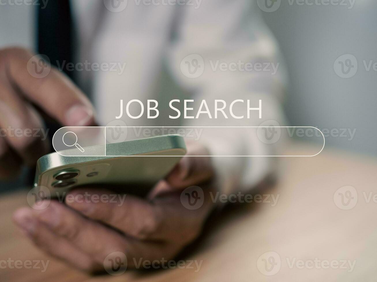 businessman using smart phone to job search on online internet. applying for a job concept. photo