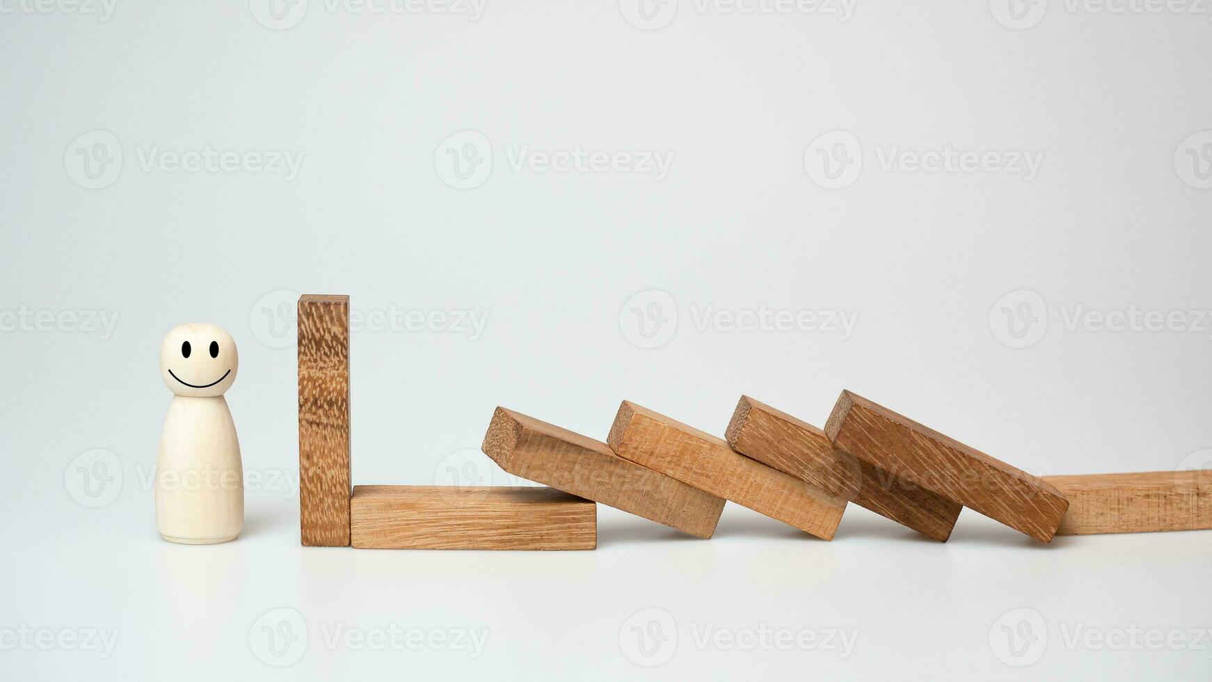 Risk management concept. Wooden block stopping dominoes effect for business. photo