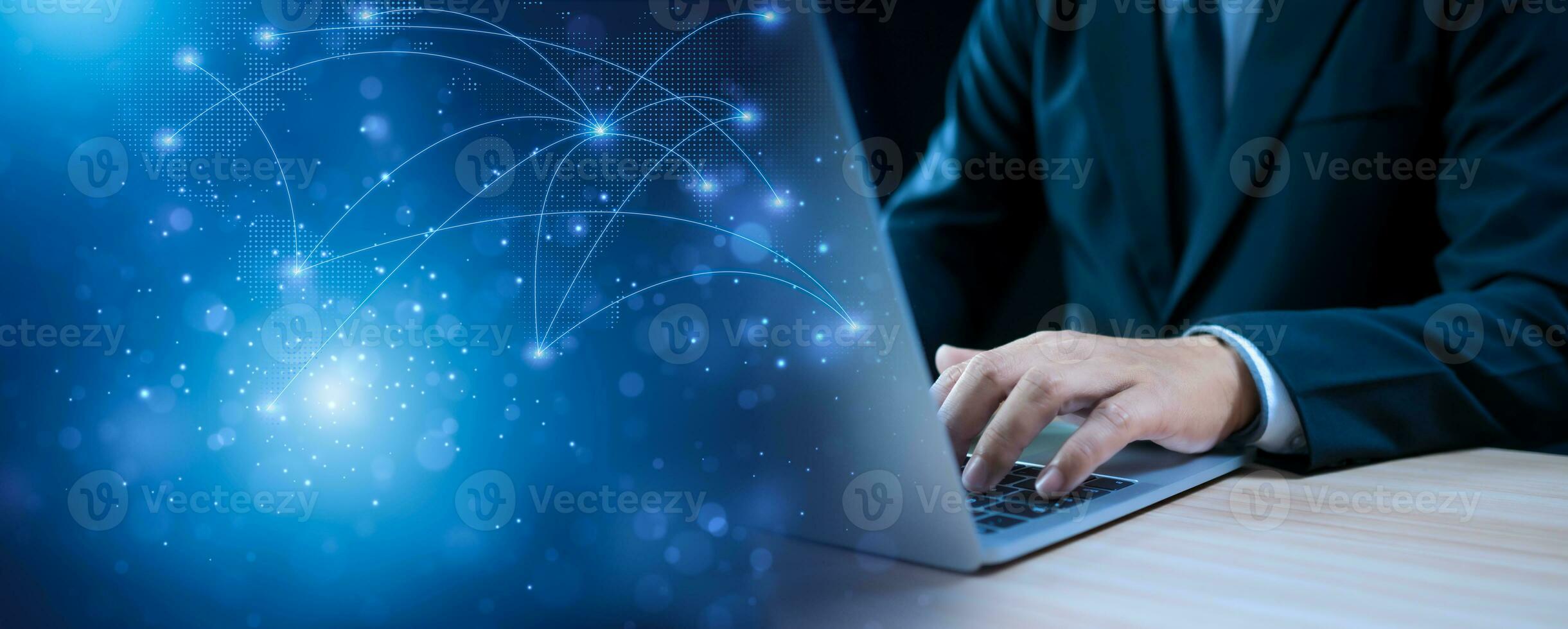 Businessman working on computer connecting business network. Network concept. Global business concept. Information exchange concept. photo