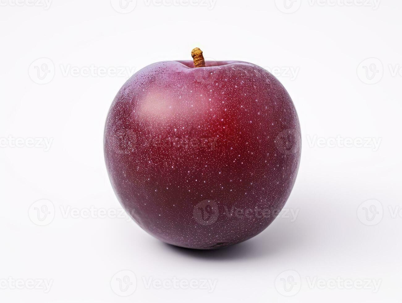 A plum fruit is isolated on a white background photo