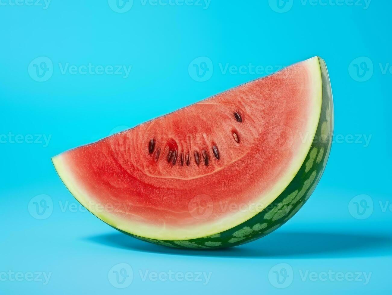 a watermelon isolated on blue background photo