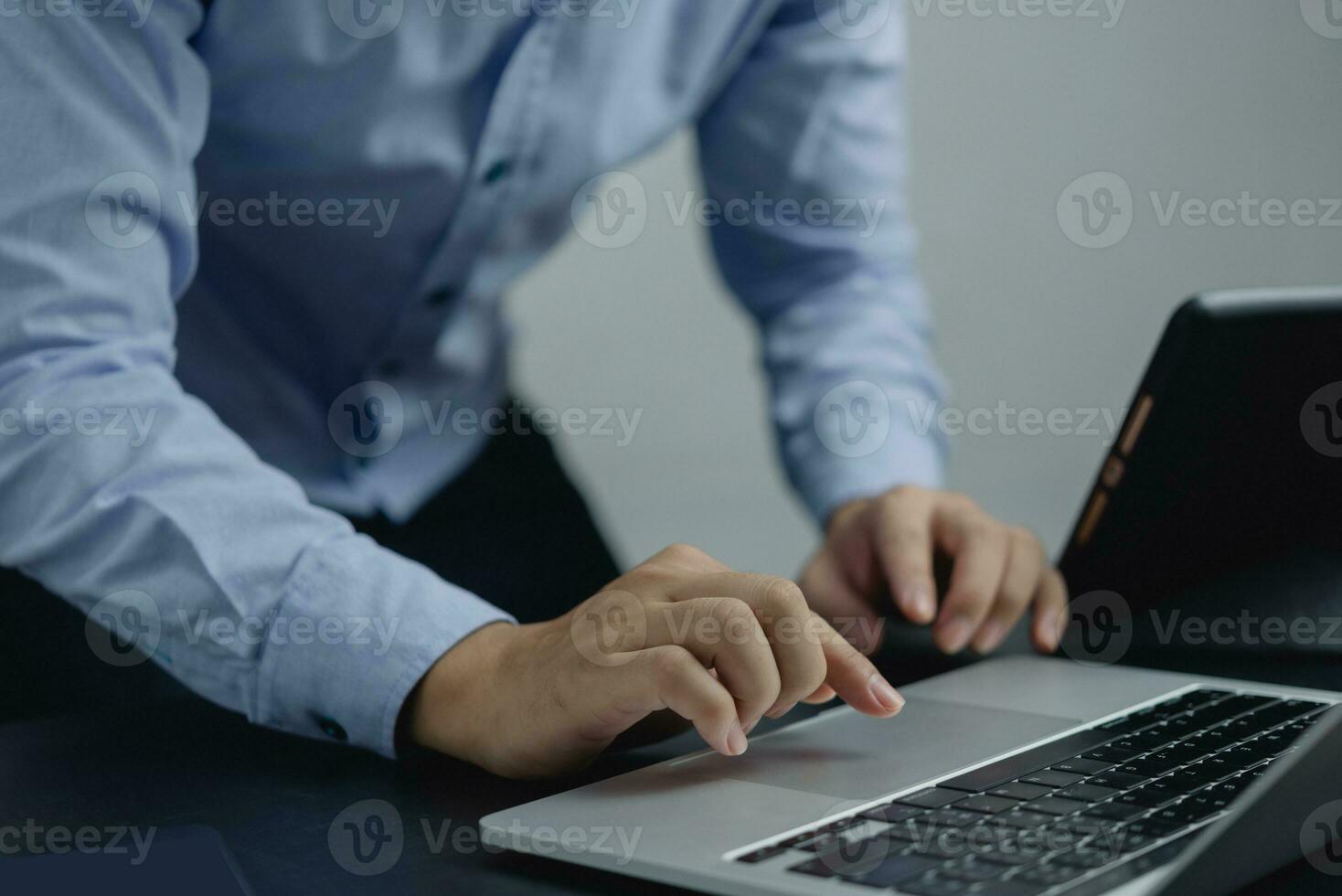Businessperson using keyboard laptop computer job search, communication social networking, internet online Information, working data marketing concept. photo