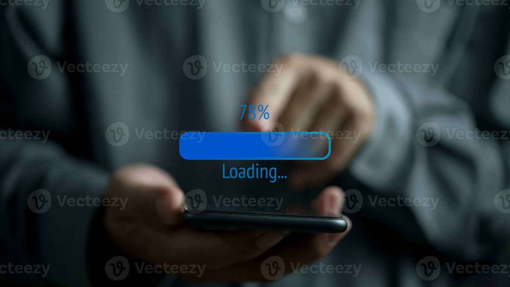 Hand holding mobile smartphone digital technology communication online loading data icon software system application virtual screen concept. photo