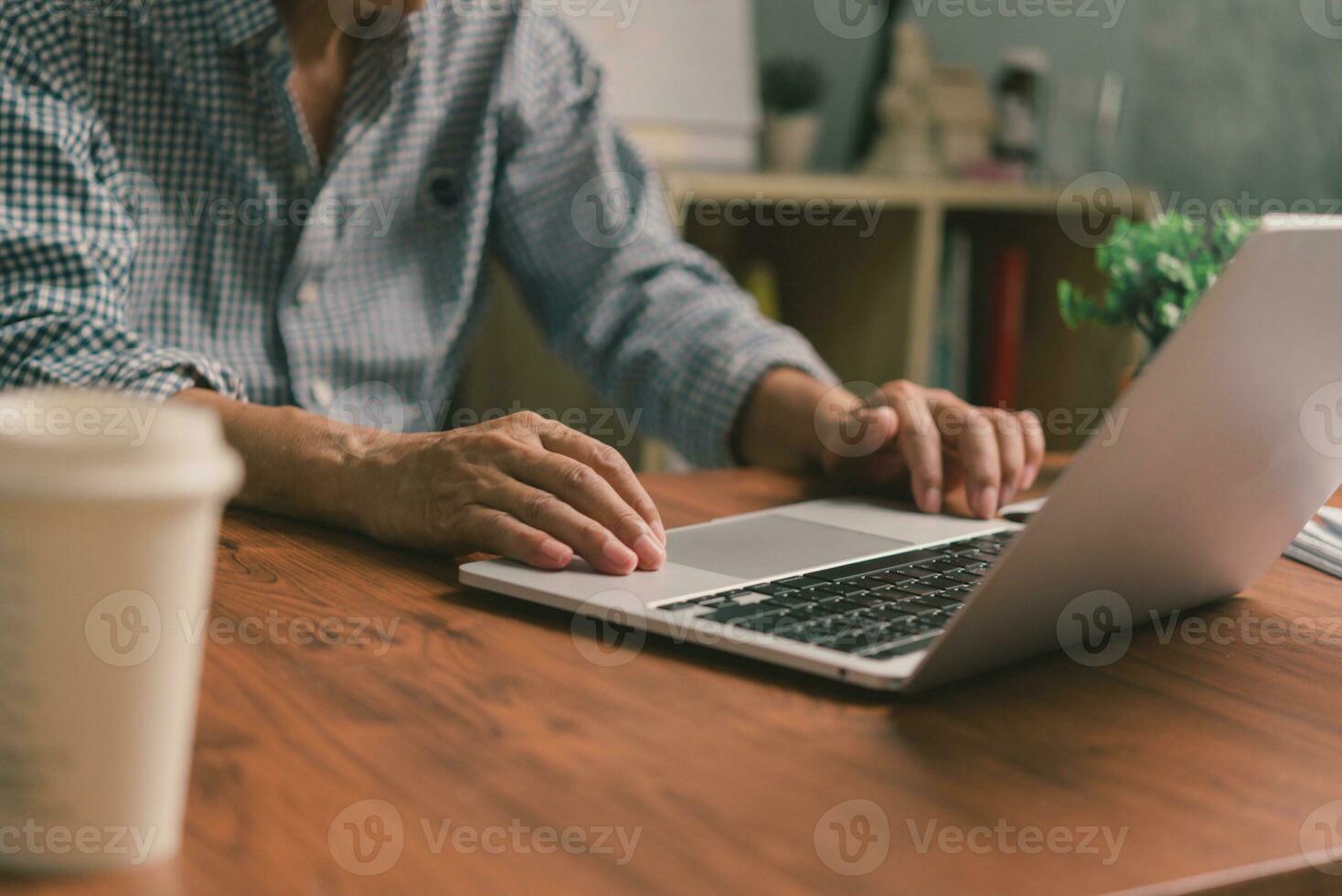 Businessperson using keyboard laptop computer job search, communication social networking, internet online Information, working data marketing concept. photo