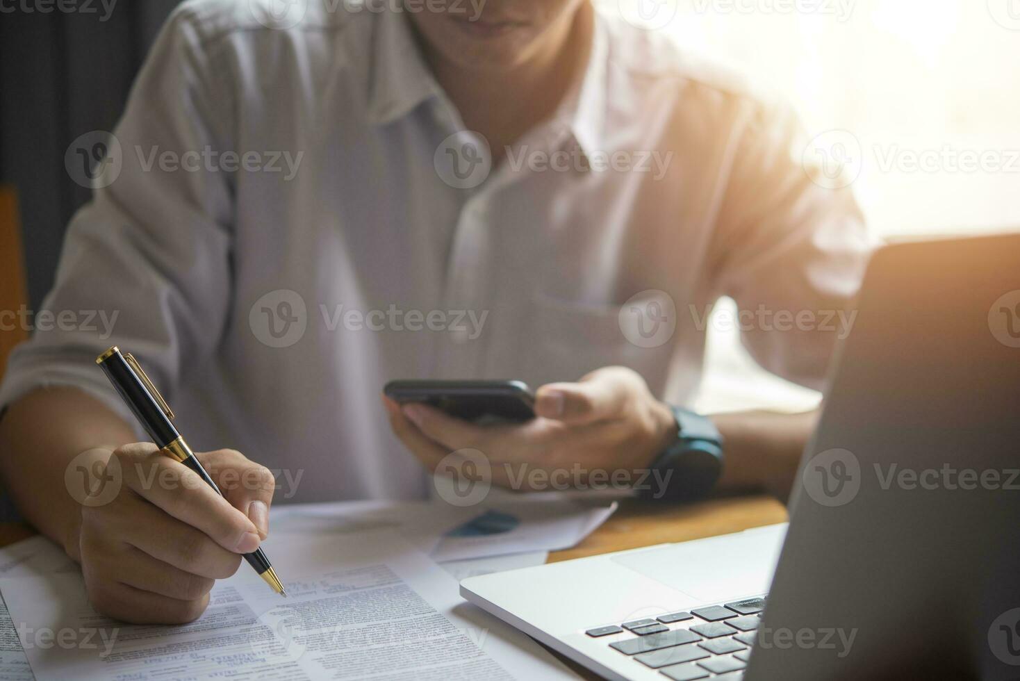 Business person Writing contract law and paper work for business and finance, write document, complete job application forms, contract real estate and insurance concept. photo