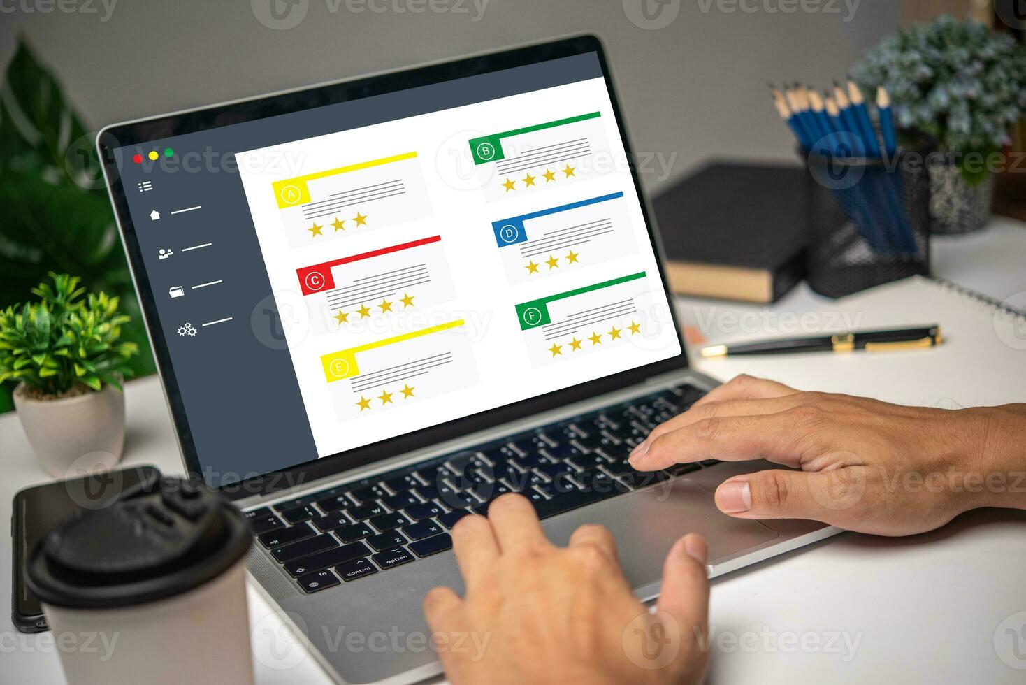 Hand using laptop computer satisfaction rating service on desk. Customer review satisfaction feedback survey client quality concept,Business marketing. photo