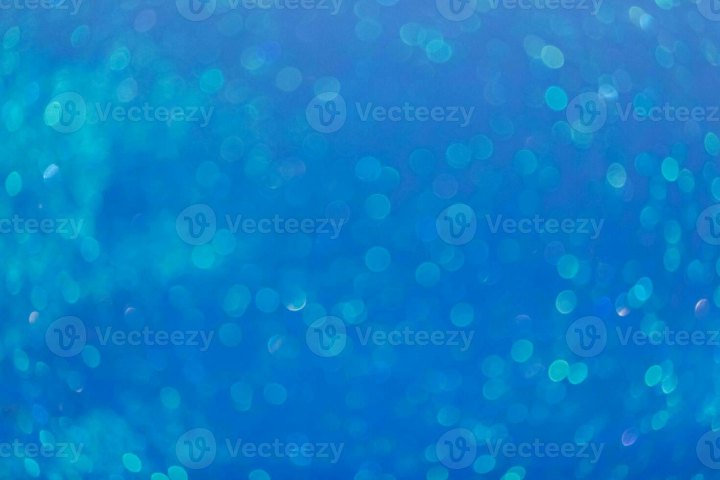 Blue abstract blured background. Merry Christmas or new year bokeh. Copy space photo