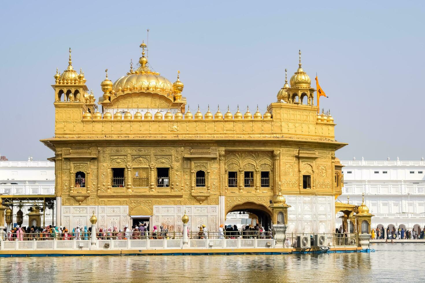 Amritsar, India - May 31 2023 - Beautiful view of Golden Temple - Harmandir Sahib in Amritsar, Punjab, India, Famous indian sikh landmark, Golden Temple, the main sanctuary of Sikhs in Amritsar, India photo