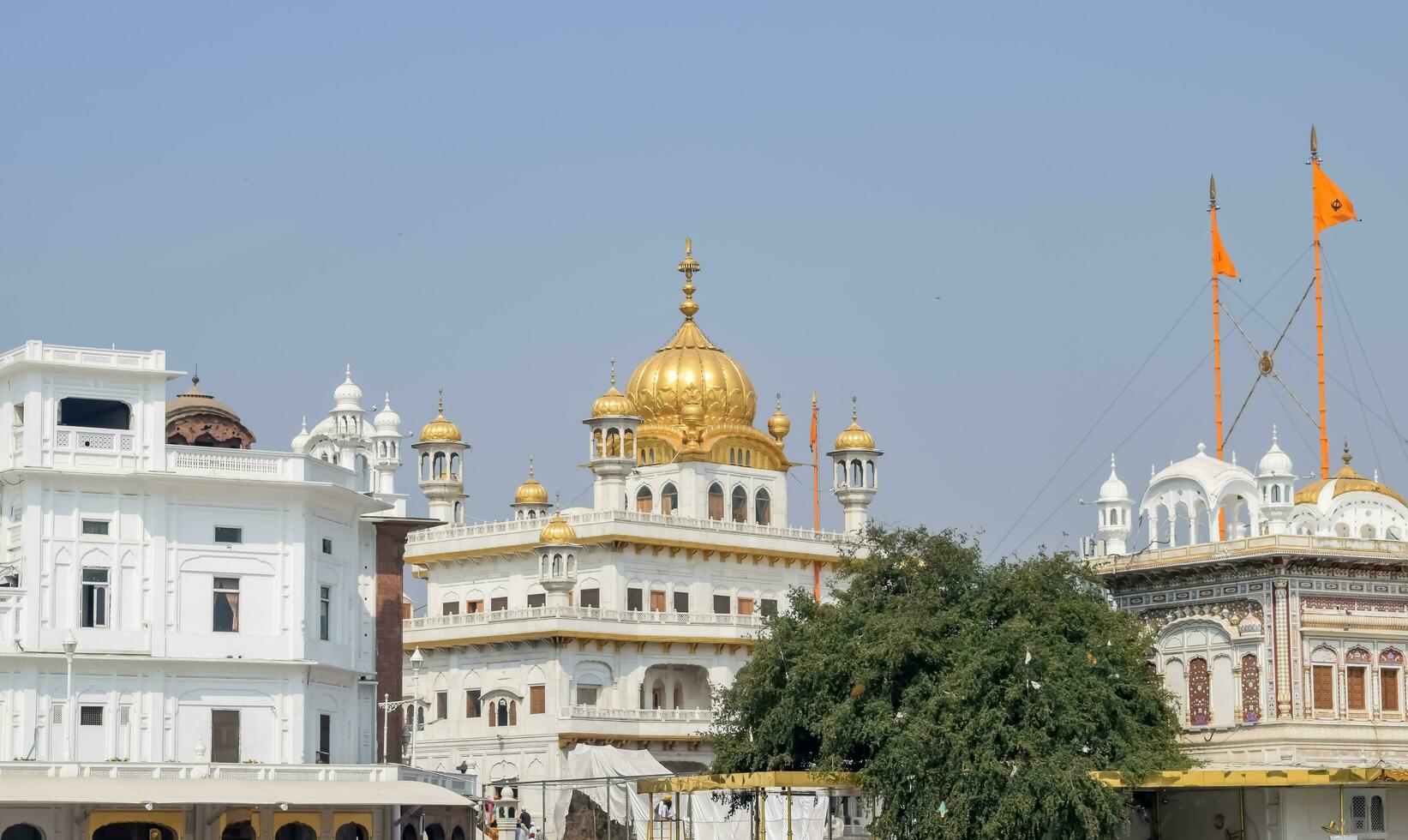 Amritsar, India - May 31 2023 - View of details of architecture inside Golden Temple - Harmandir Sahib in Amritsar, Punjab, India, Famous indian sikh landmark, Golden Temple, the main sanctuary photo
