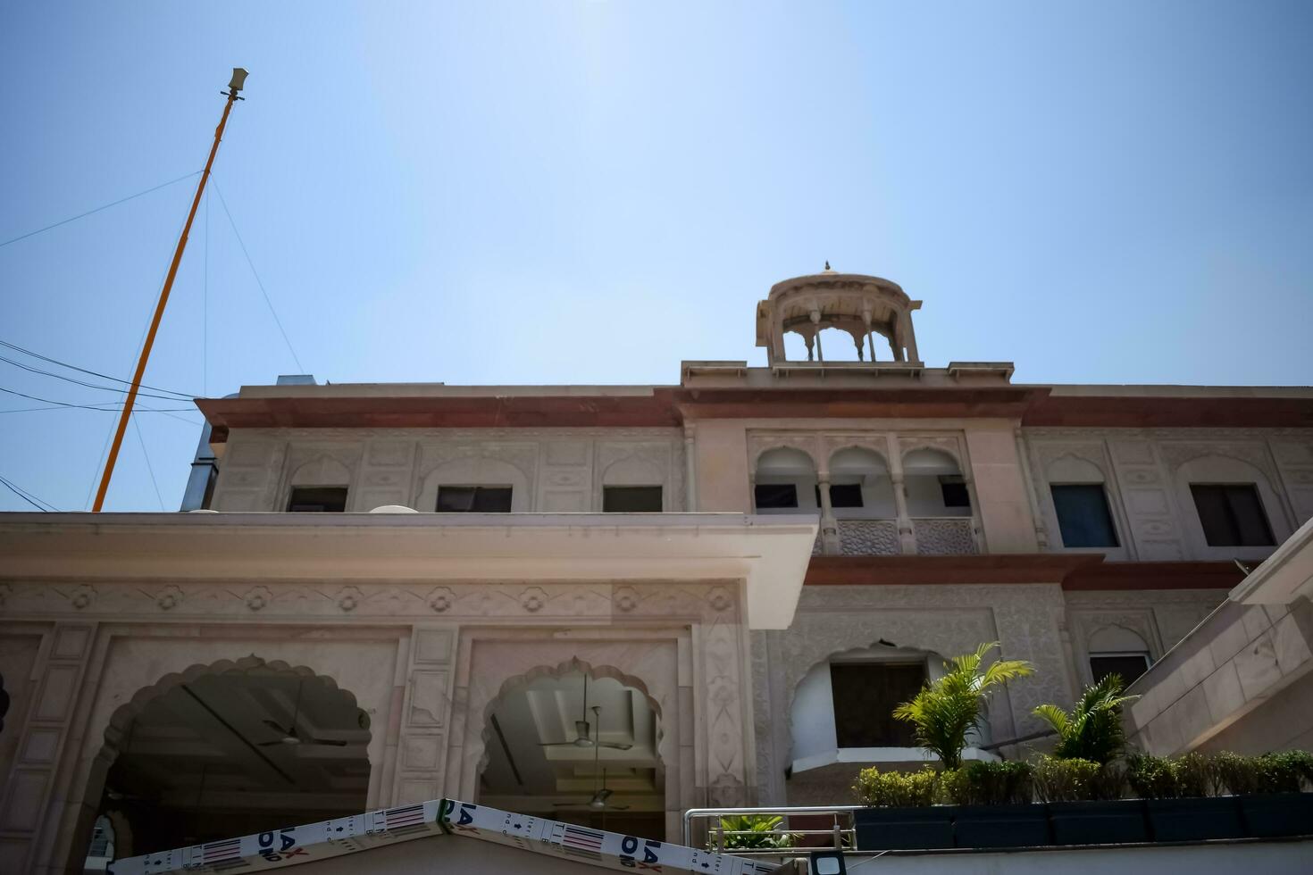 New Delhi, India, May 23 2023 - Gurudwara Sis Ganj Sahib is one of the nine historical Gurdwaras in Old Delhi in India, Sheesh Ganj Gurudwara in Chandni Chowk, opposite Red Fort in Old Delhi India photo