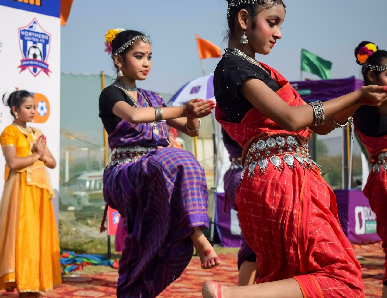 New Delhi, India - July 01 2023 - Bharathanatyam Indian classical odissi dancers performing at stage. Beautiful Indian girl dancers in the posture of Indian dance. Indian classical dance Bharatanatyam photo