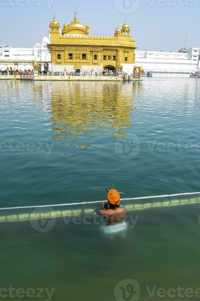 Beautiful view of Golden Temple - Harmandir Sahib in Amritsar, Punjab, India, Famous indian sikh landmark, Golden Temple, the main sanctuary of Sikhs in Amritsar, India photo