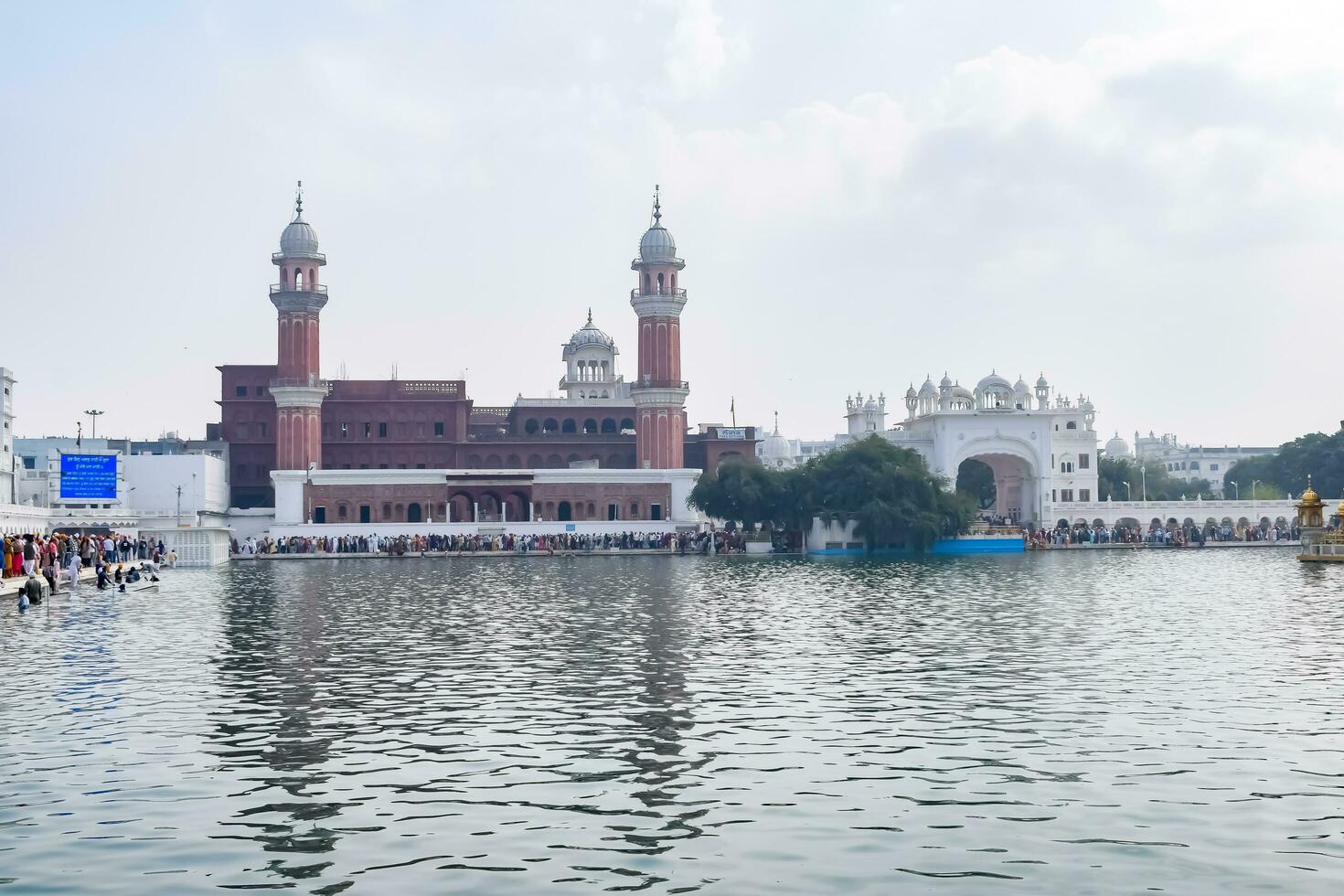 Amritsar, India - May 31 2023 - View of details of architecture inside Golden Temple - Harmandir Sahib in Amritsar, Punjab, India, Famous indian sikh landmark, Golden Temple, the main sanctuary photo