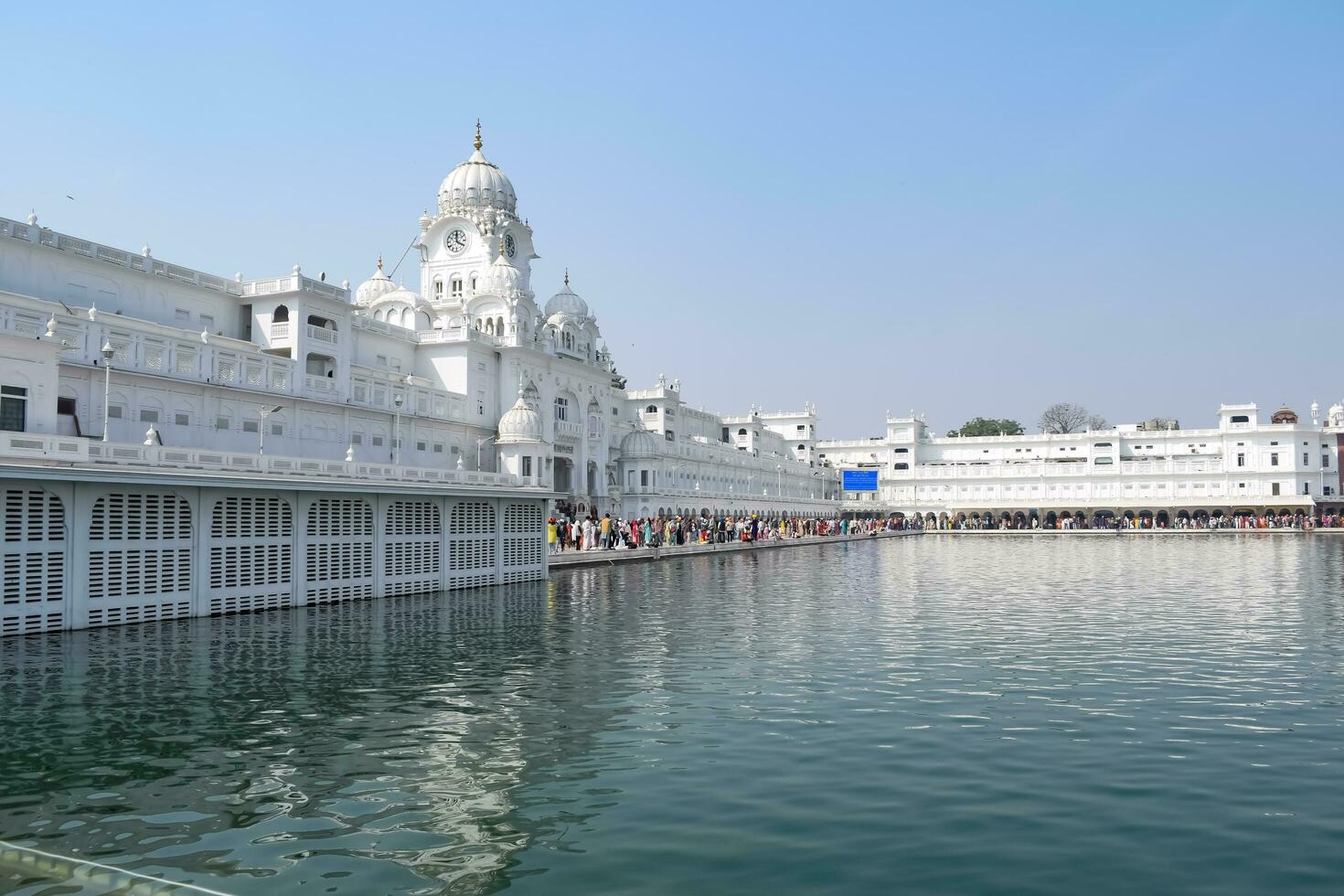 Amritsar, India - May 31 2023 - View of details of architecture inside Golden Temple - Harmandir Sahib in Amritsar, Punjab, India, Famous indian sikh landmark, Golden Temple, the main sanctuary photo
