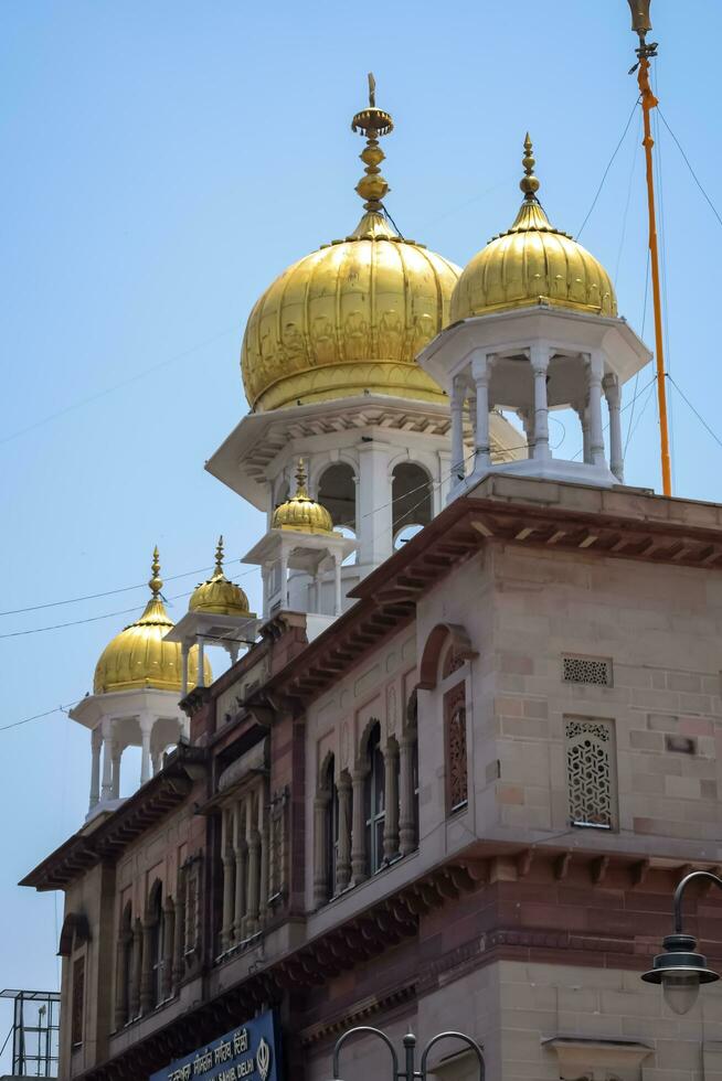 New Delhi, India, May 23 2023 - Gurudwara Sis Ganj Sahib is one of the nine historical Gurdwaras in Old Delhi in India, Sheesh Ganj Gurudwara in Chandni Chowk, opposite Red Fort in Old Delhi India photo
