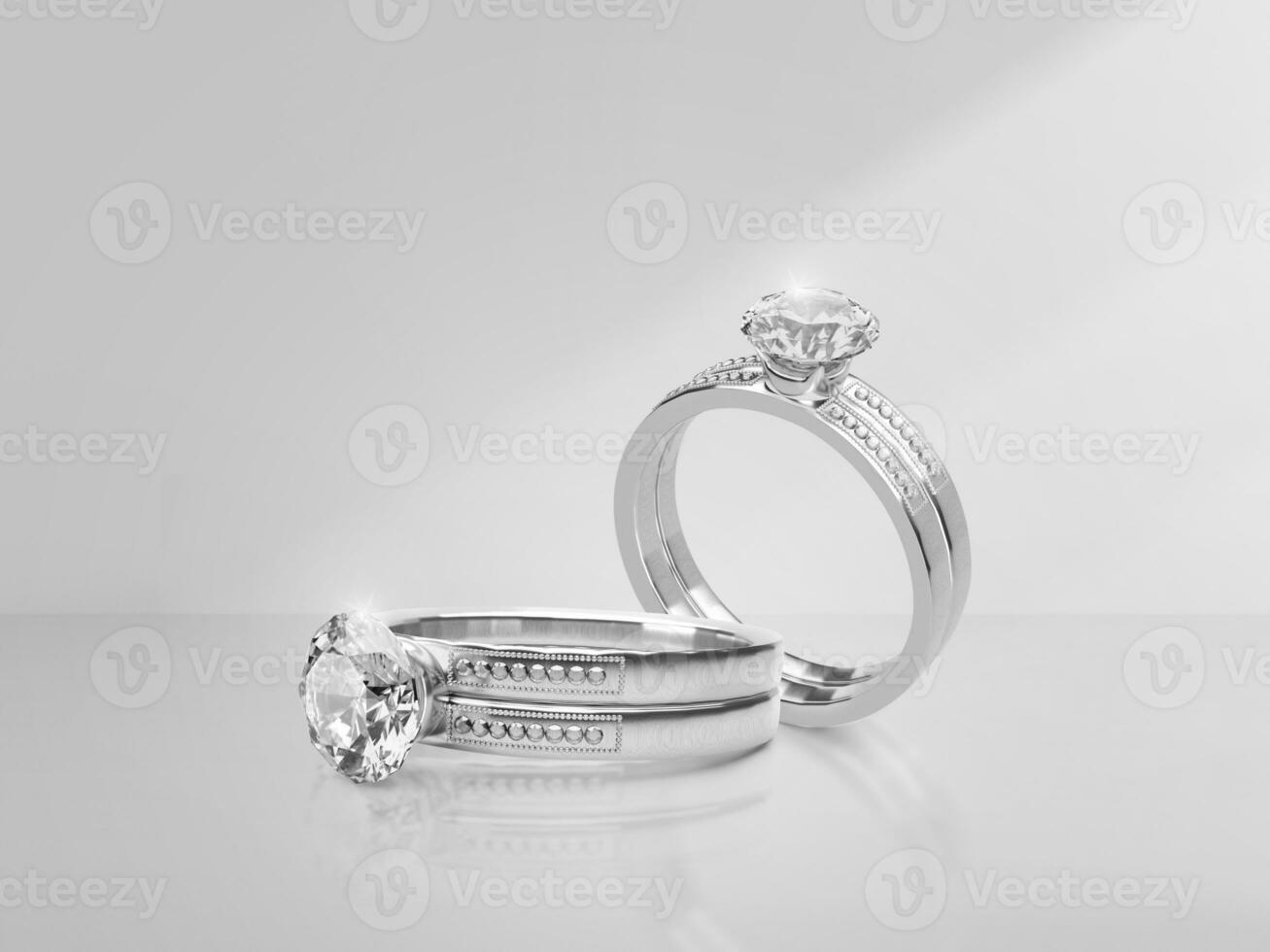 Elegant diamond ring on light background with shadows photo