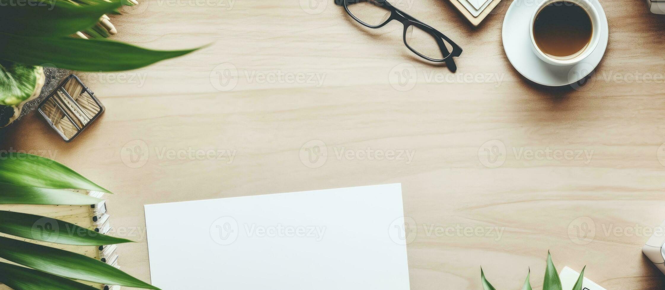 Photo of a laptop and coffee on a wooden table with copy space
