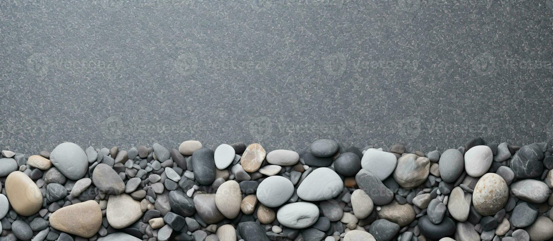 Photo of black and white rocks and gravel with empty space for text or design with copy space
