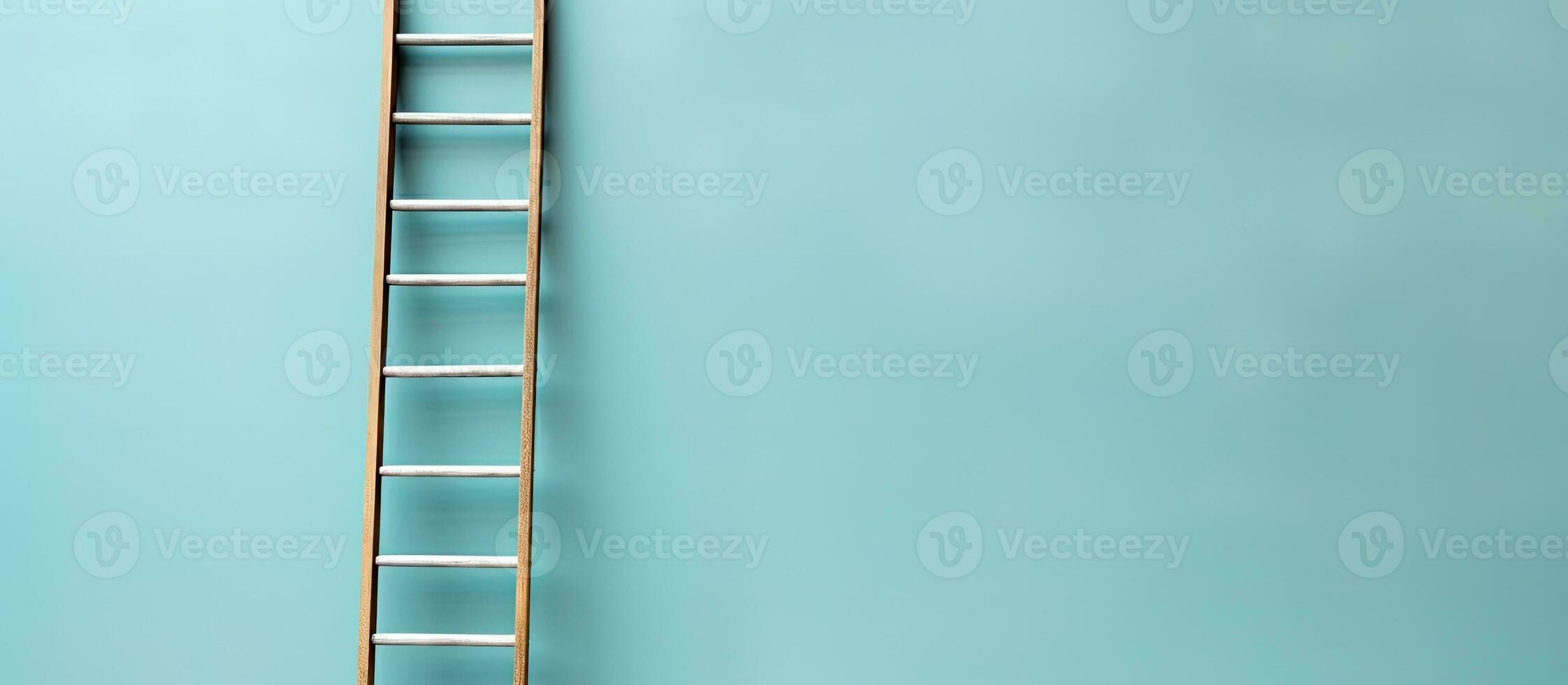 Photo of a ladder leaning against a vibrant blue wall with copy space