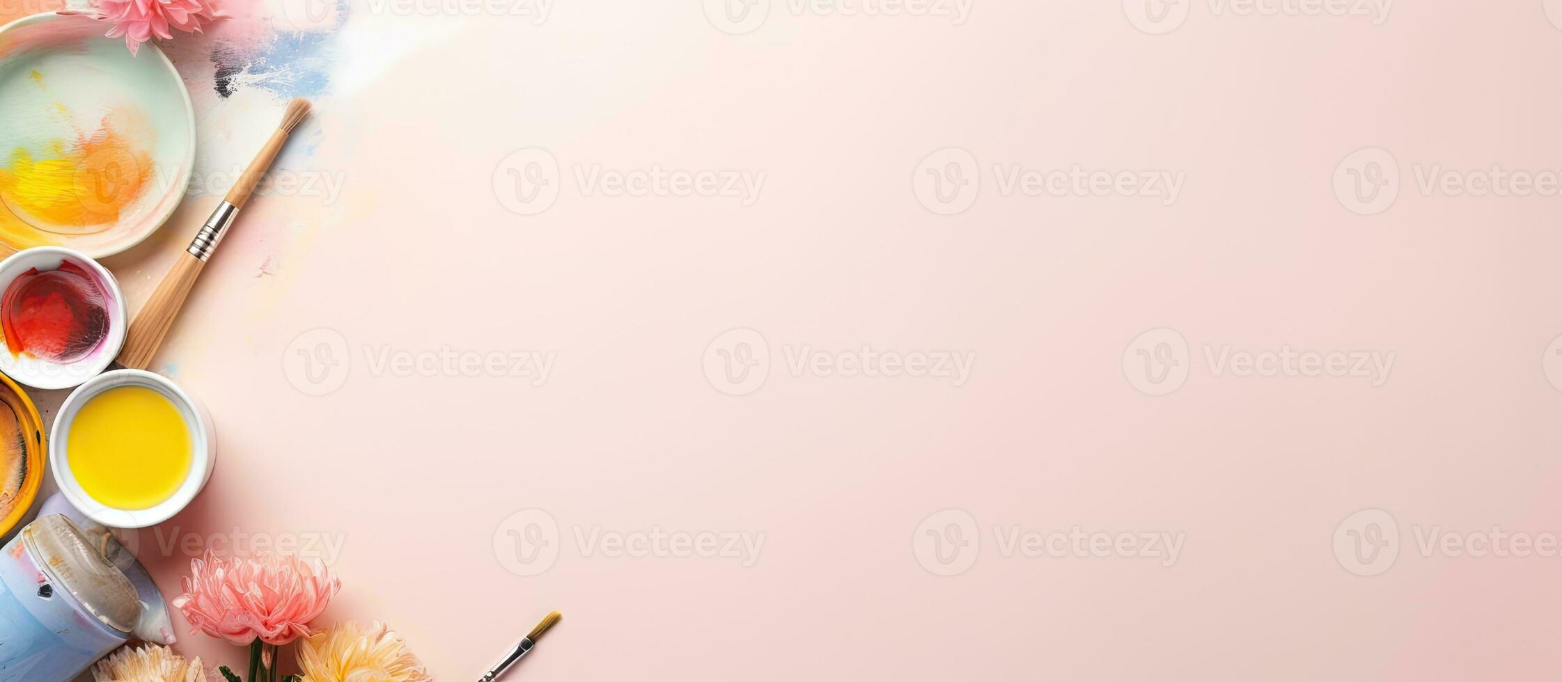 Photo of a colorful table filled with various types of paint with copy space