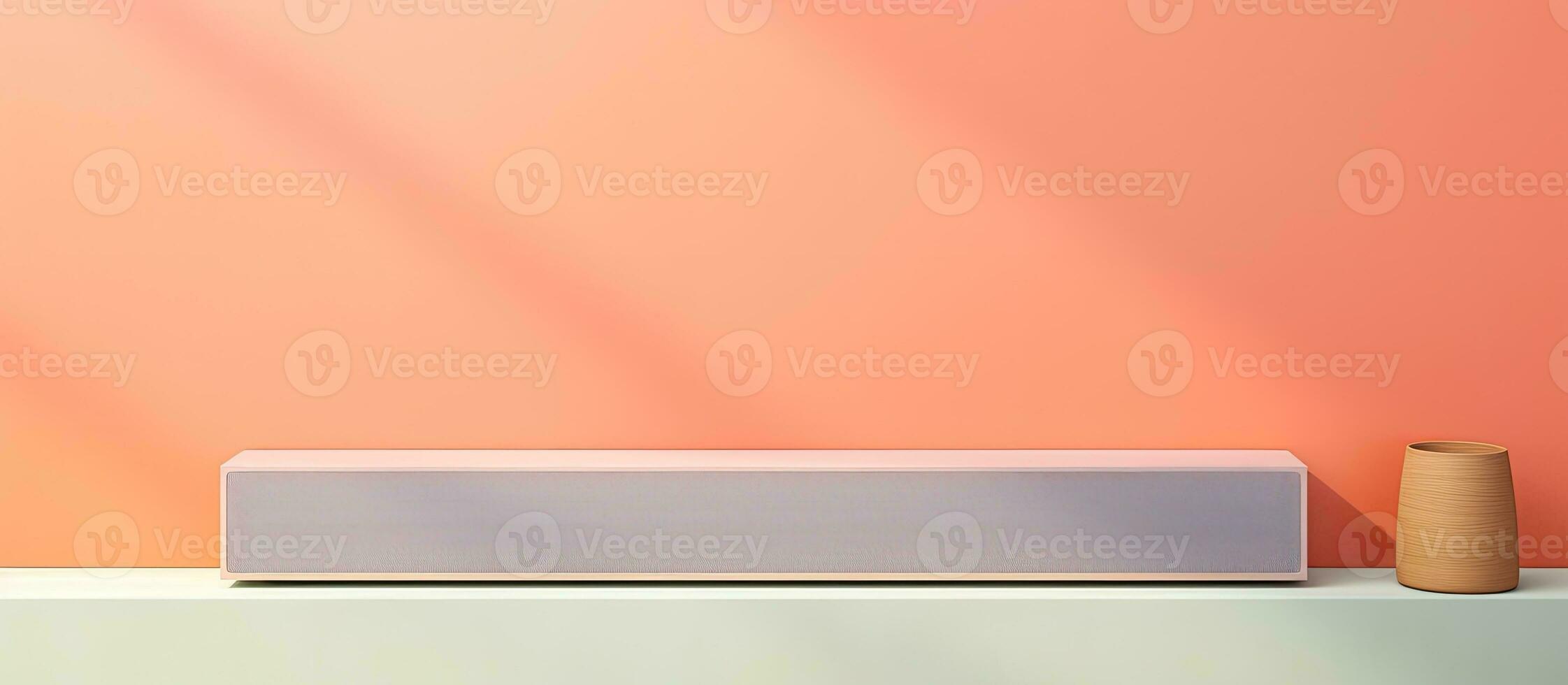 Photo of a speaker and a vase on a table with copy space