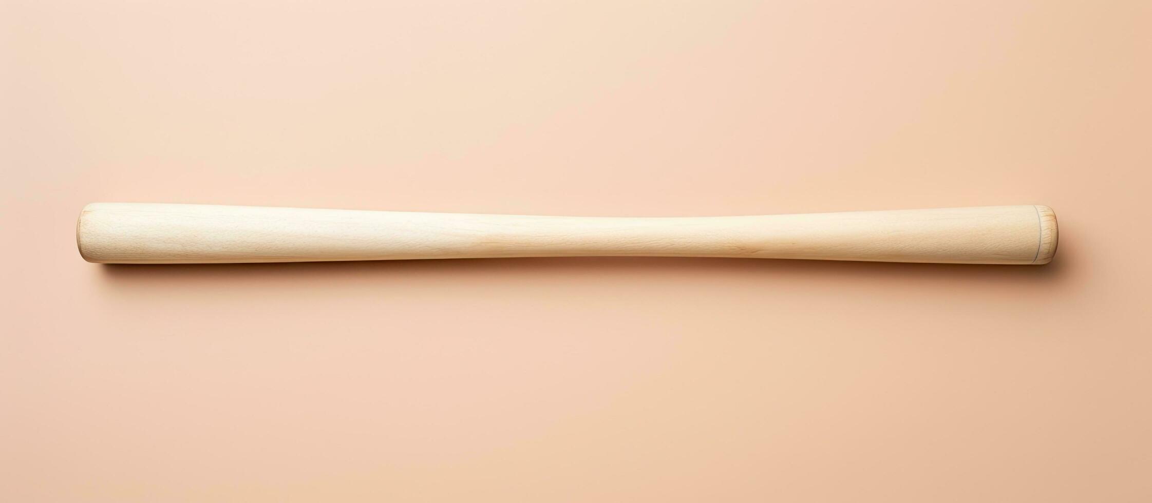 Photo of a wooden baseball bat against a vibrant pink wall with empty space for text or design with copy space